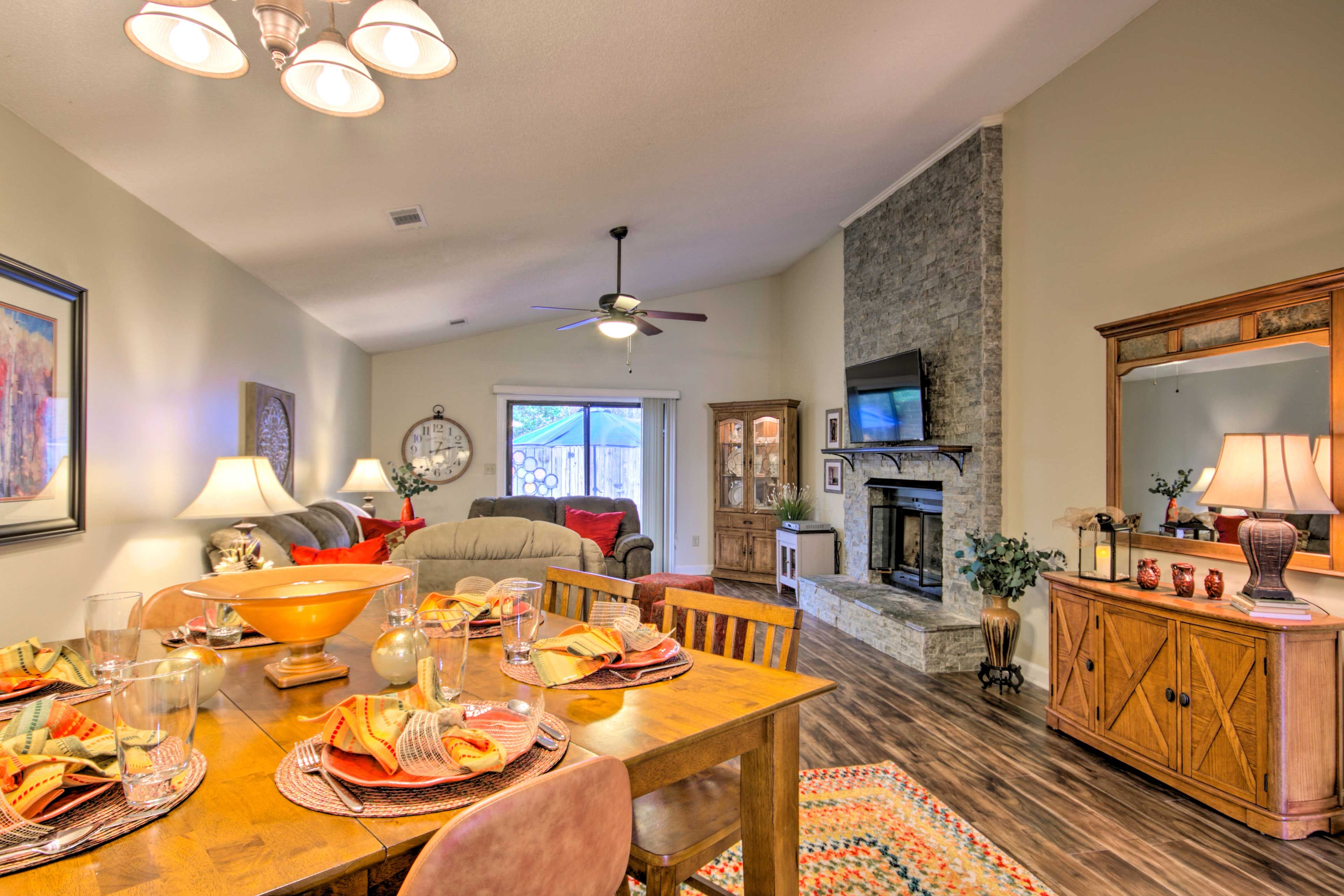 Colorful decor invites you to take a seat at the table or on one of the couches.