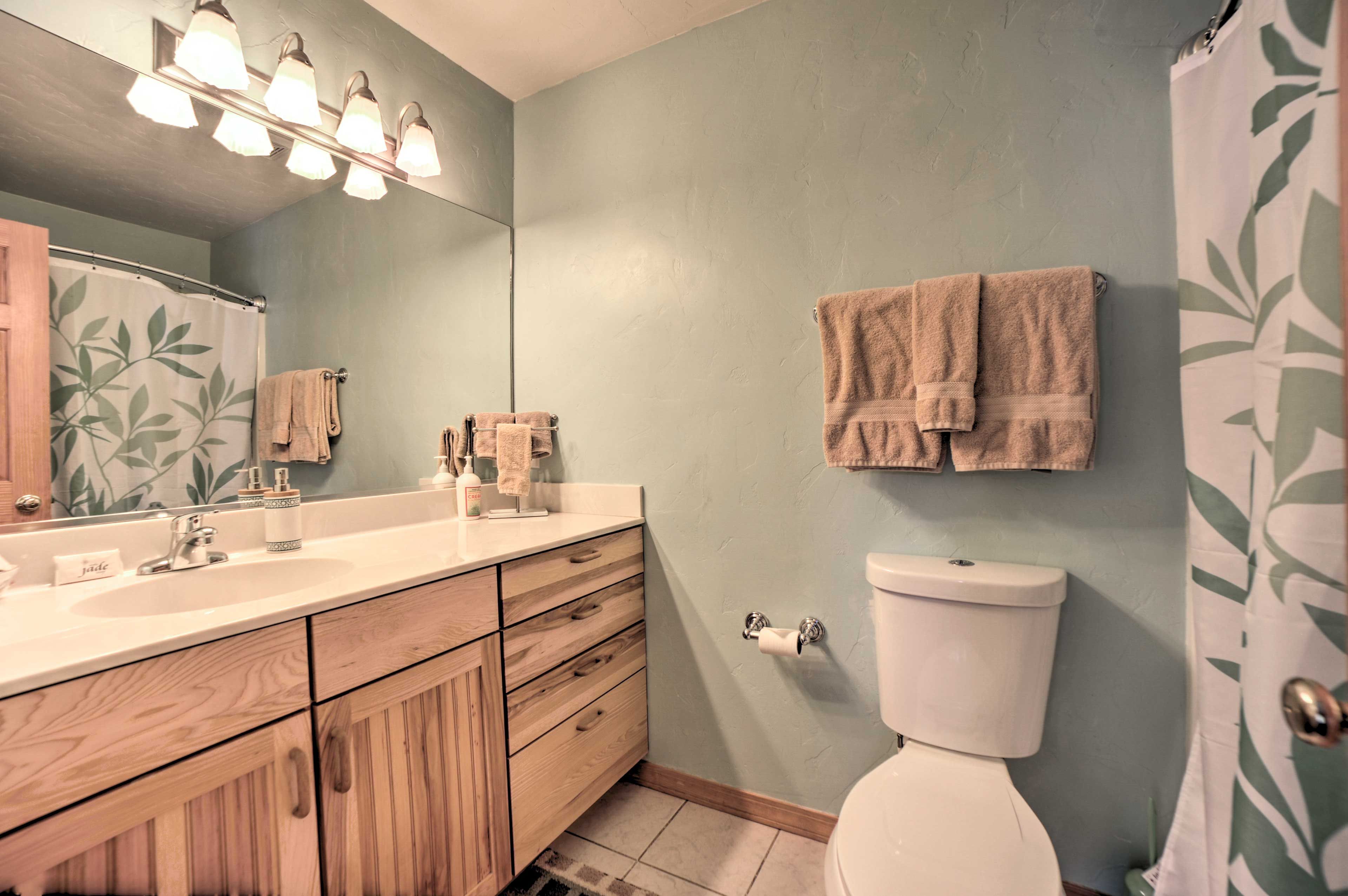 Prep for the day in this full bath!
