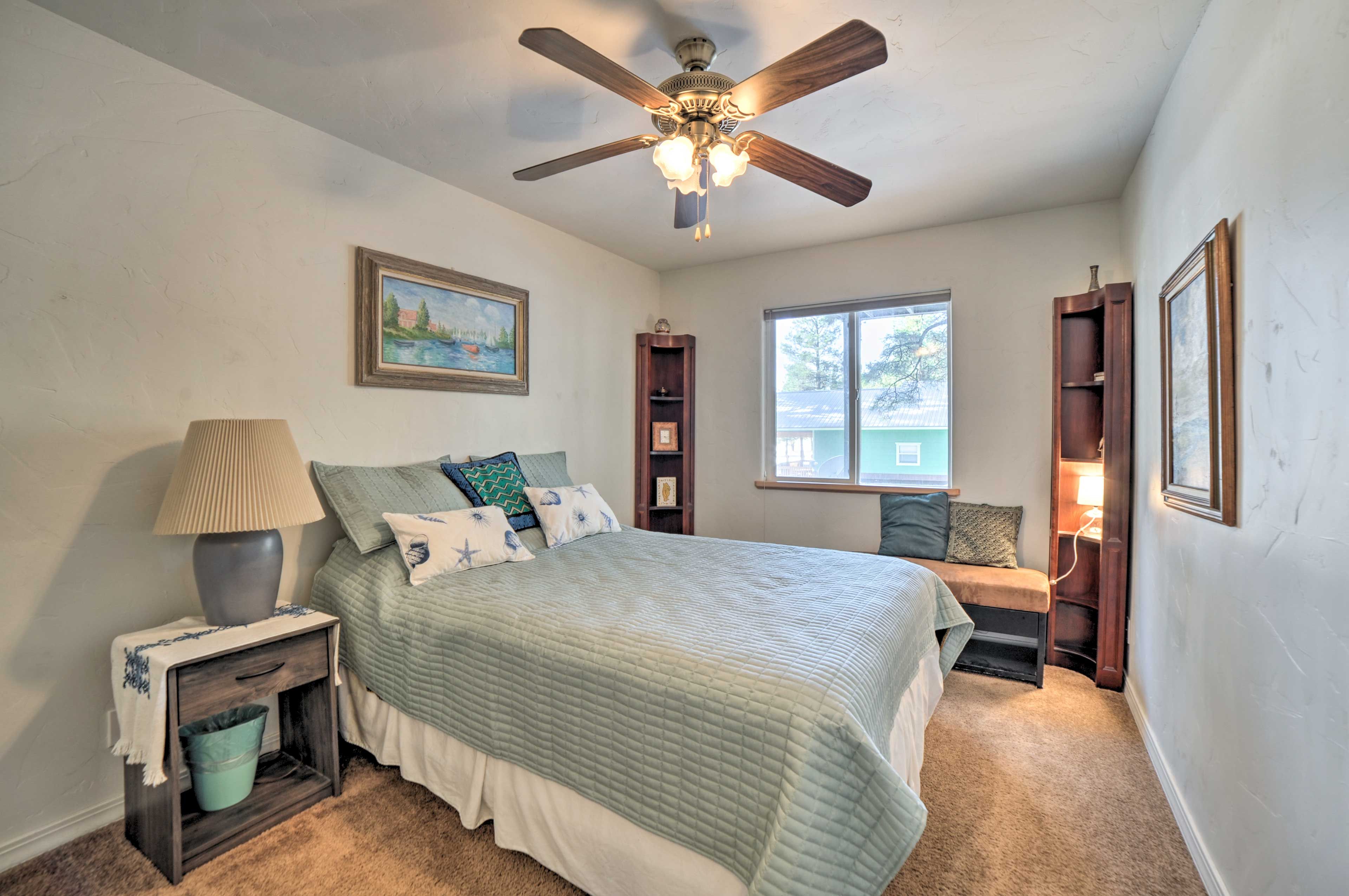 This bedroom houses a full-sized bed.