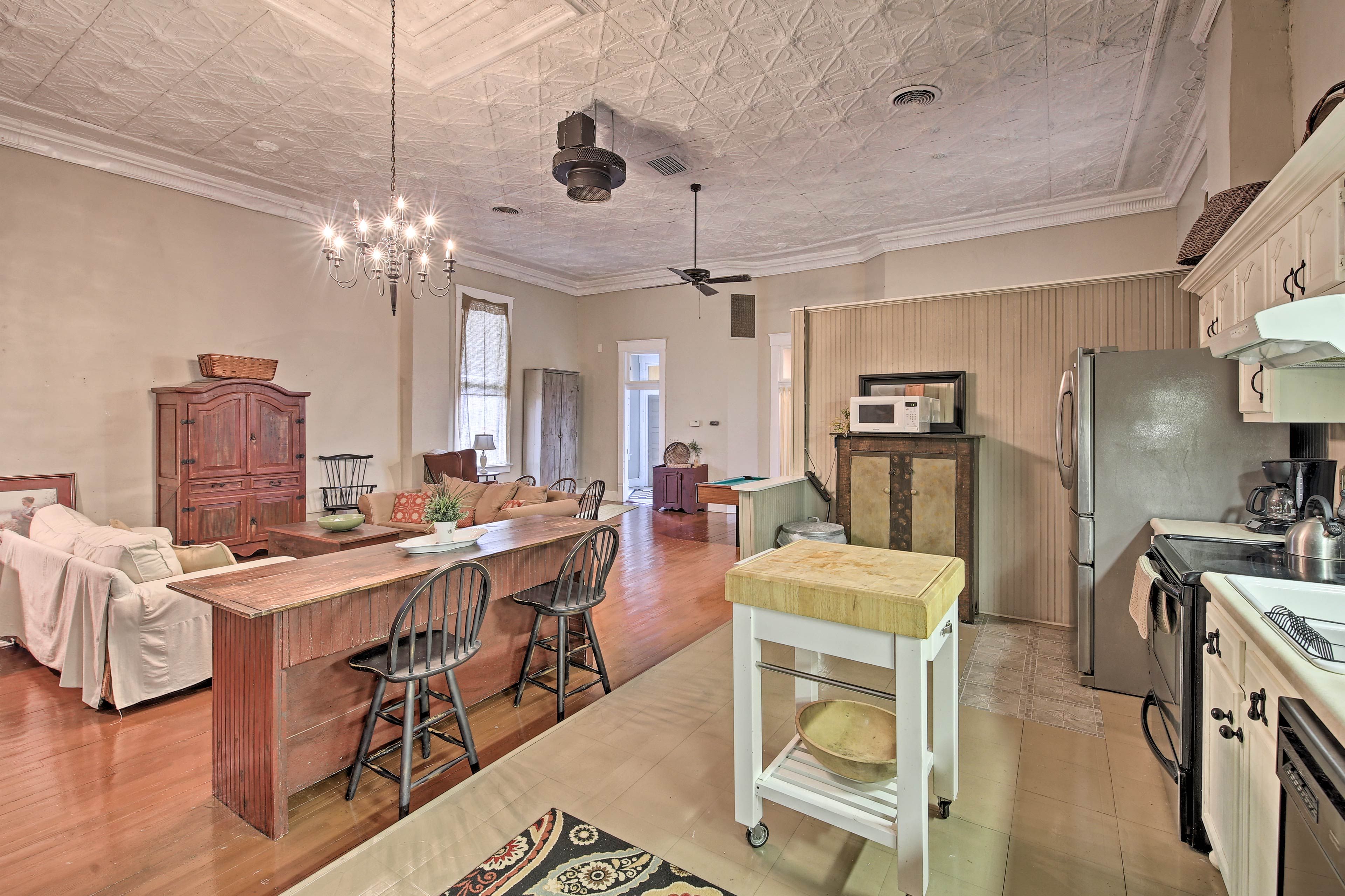 Keep the cook company at the bar with seating for 2.