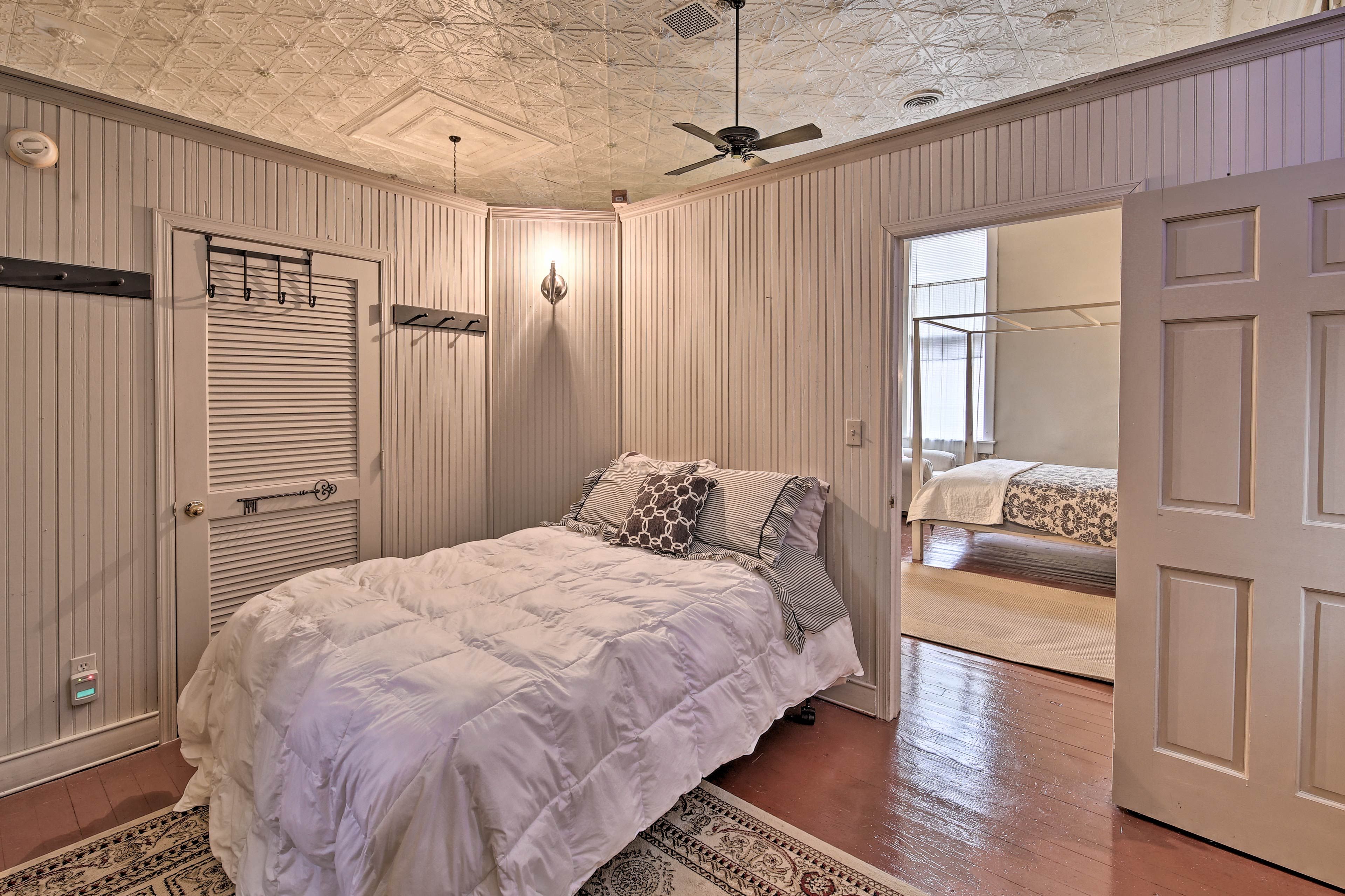 Two more guests can rest tired eyes on the queen bed in the second bedroom.
