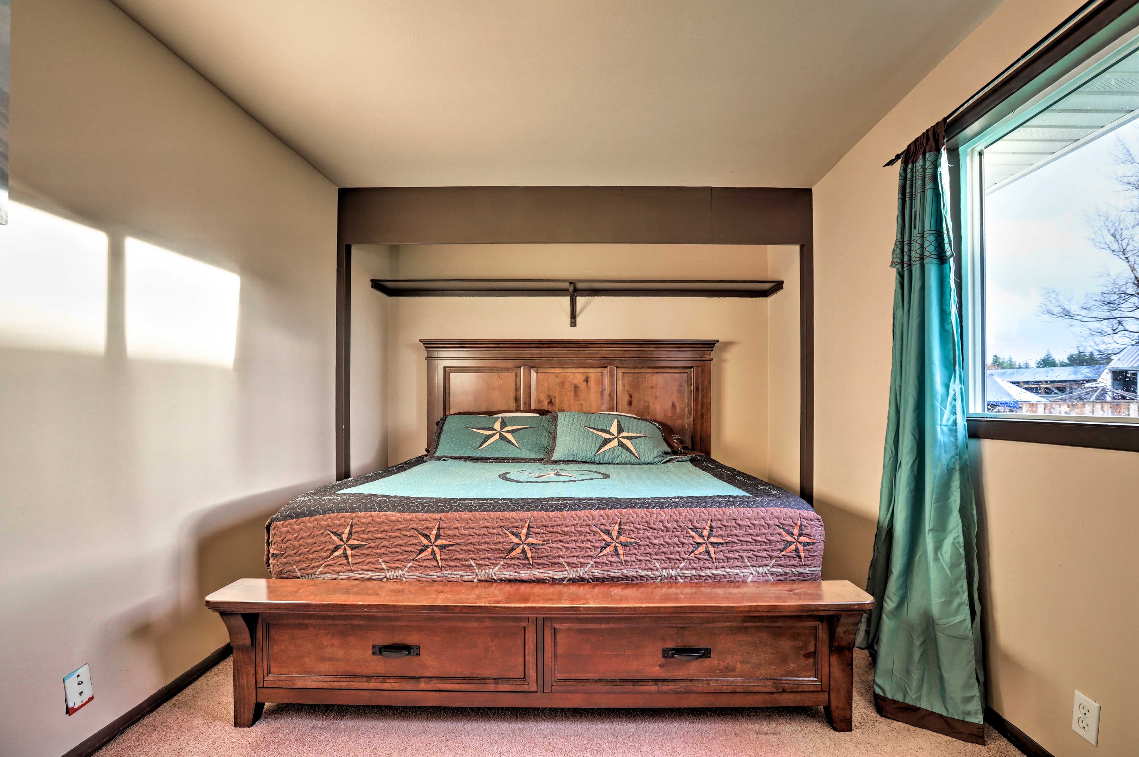 Store your clothes in the dresser at the foot of the bed.