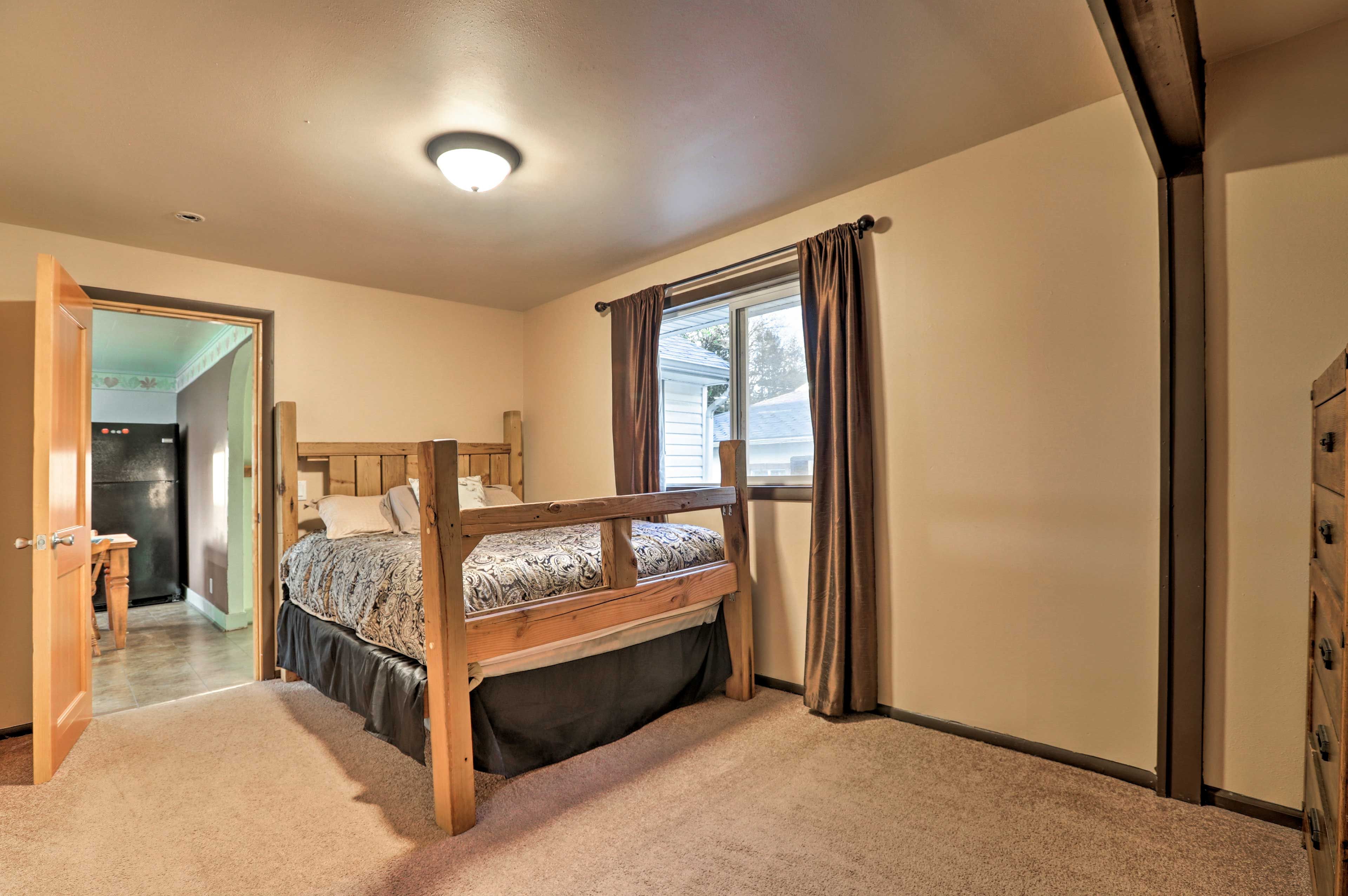 Cozy up in the queen bed.
