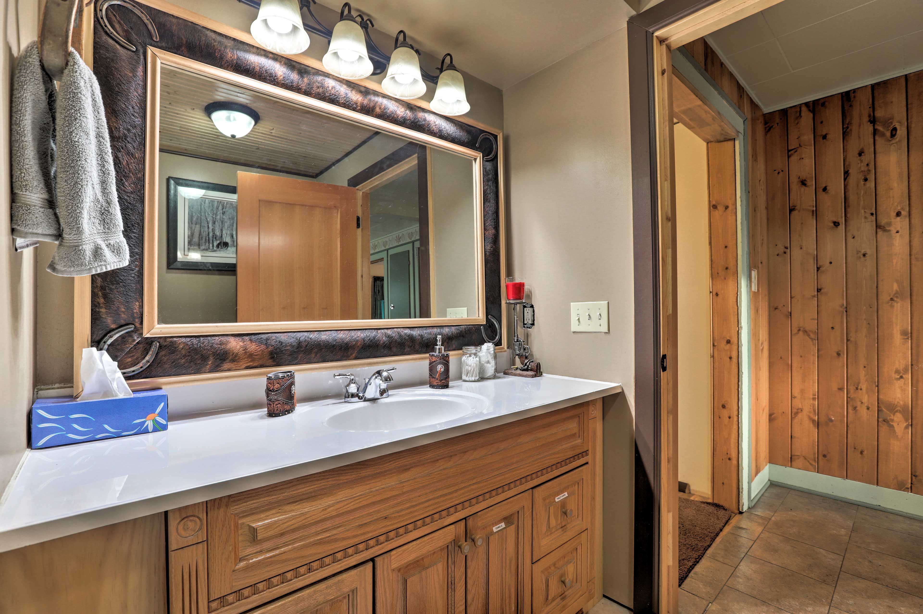 There's plenty of counter space in the bathroom to get ready each morning.