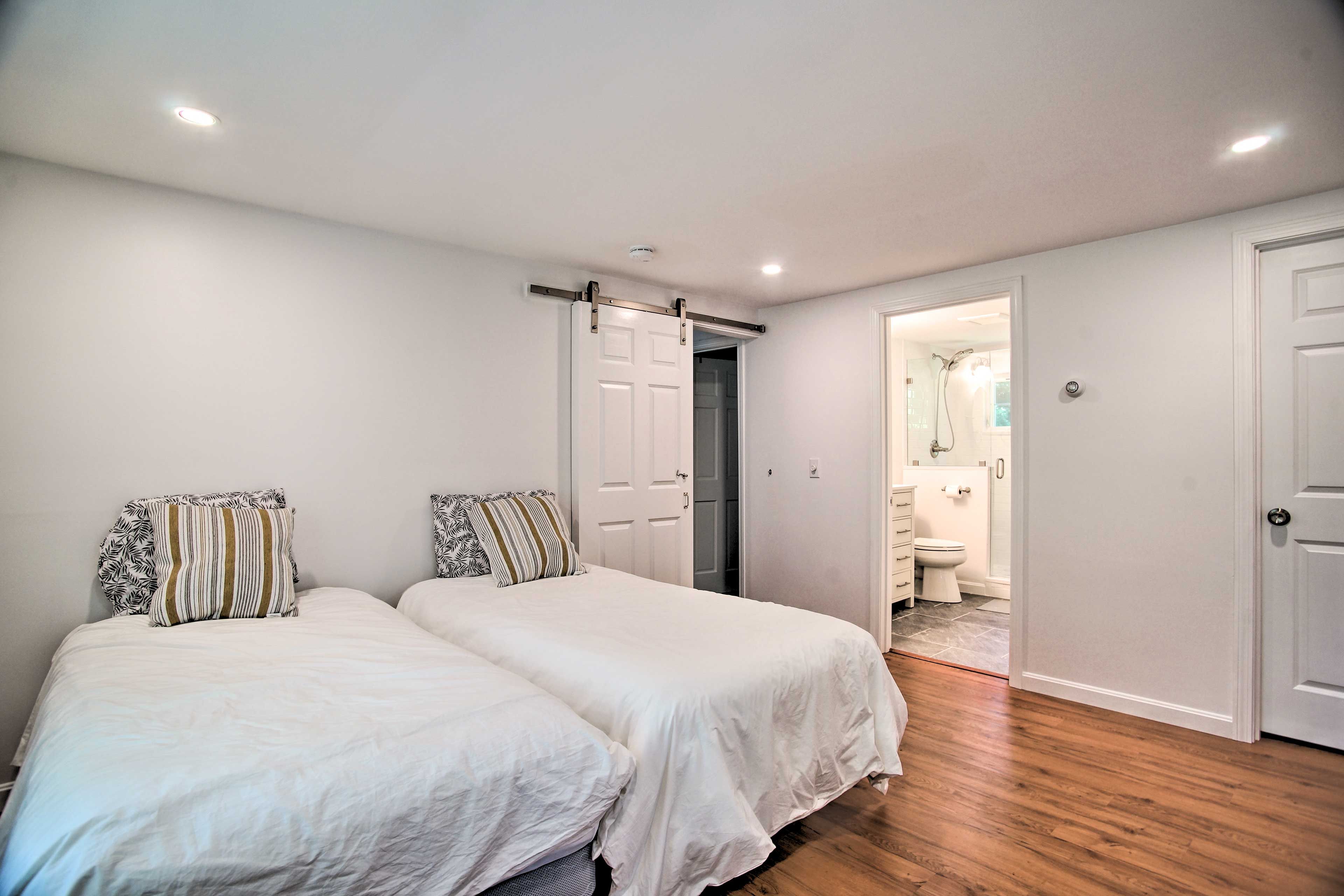 Bedroom 1 | 2 Twin Beds | 1st Floor | En-Suite Bathroom | Linens Provided