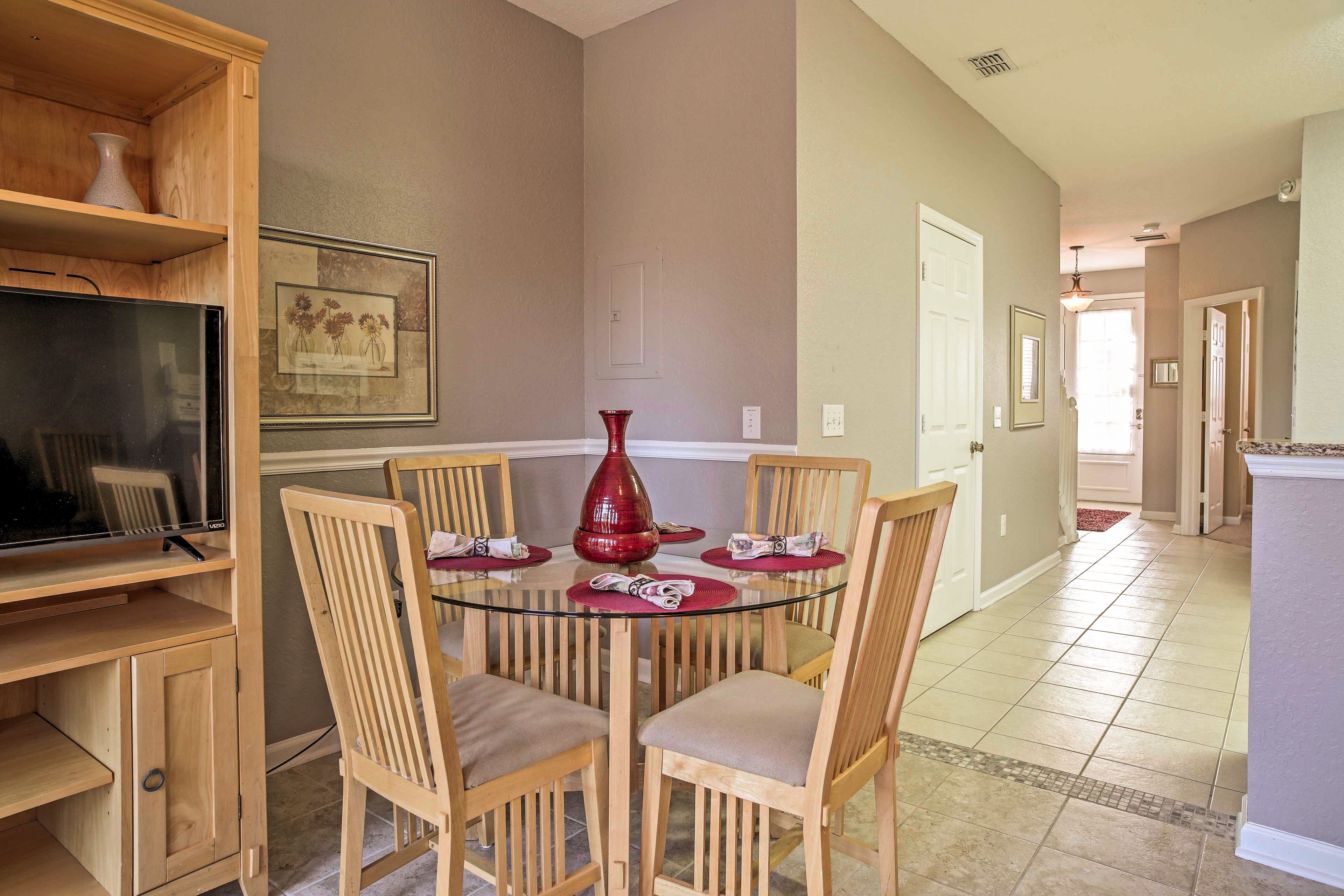 Share meals around the glass-top table and discuss what you'll do first.