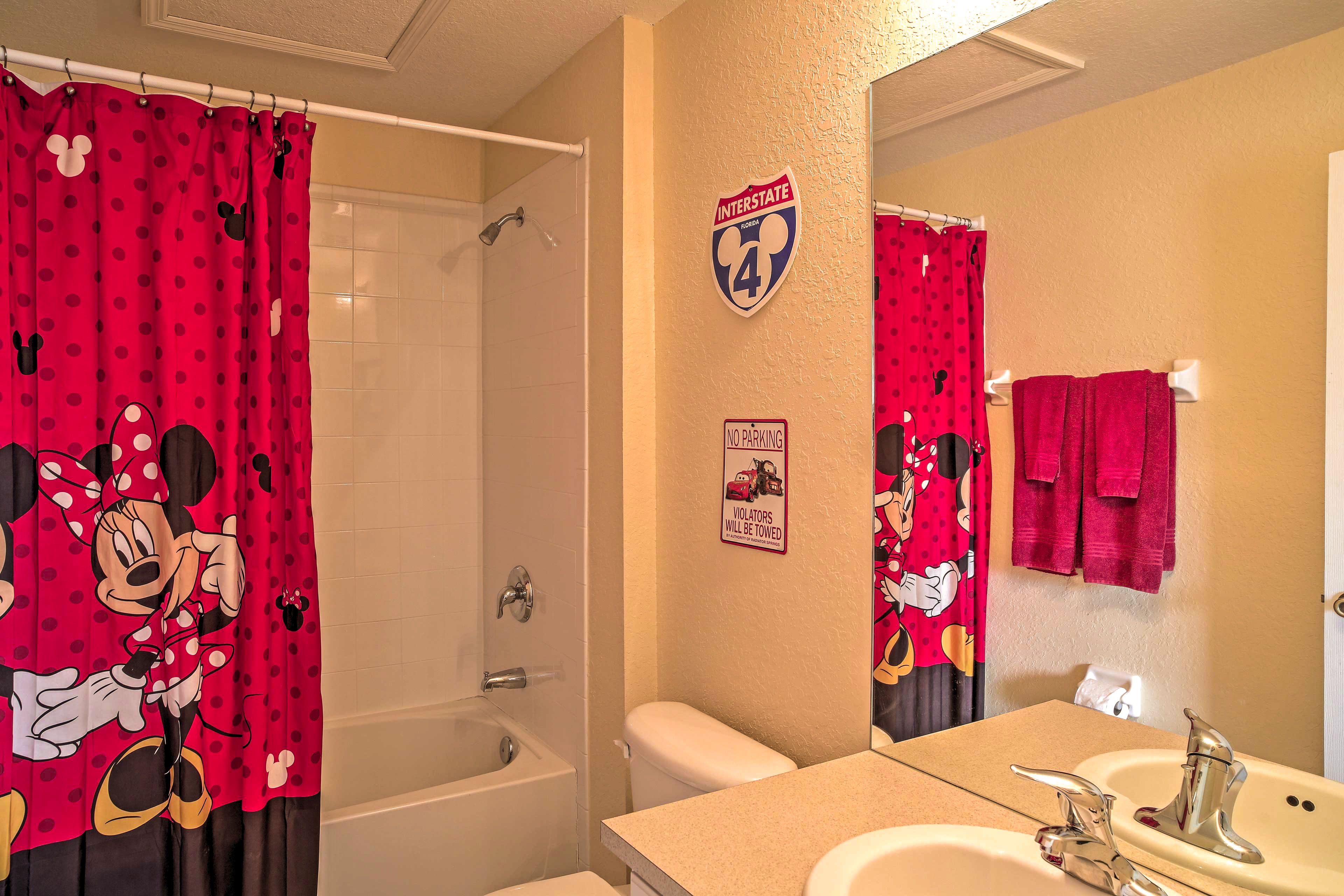 The final bathroom features a shower/tub combo.