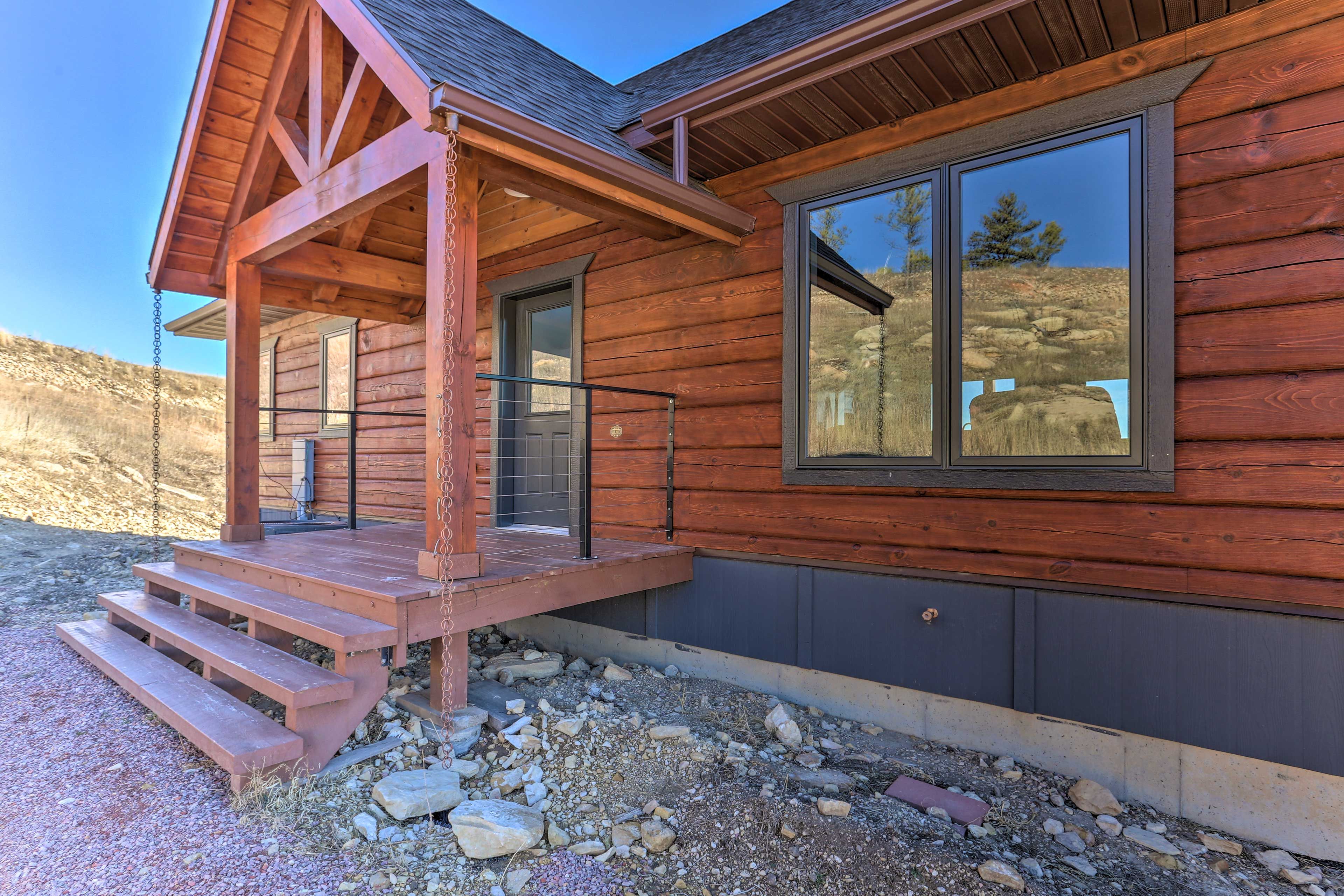 This charming cabin is set in a peaceful Black Hills setting.