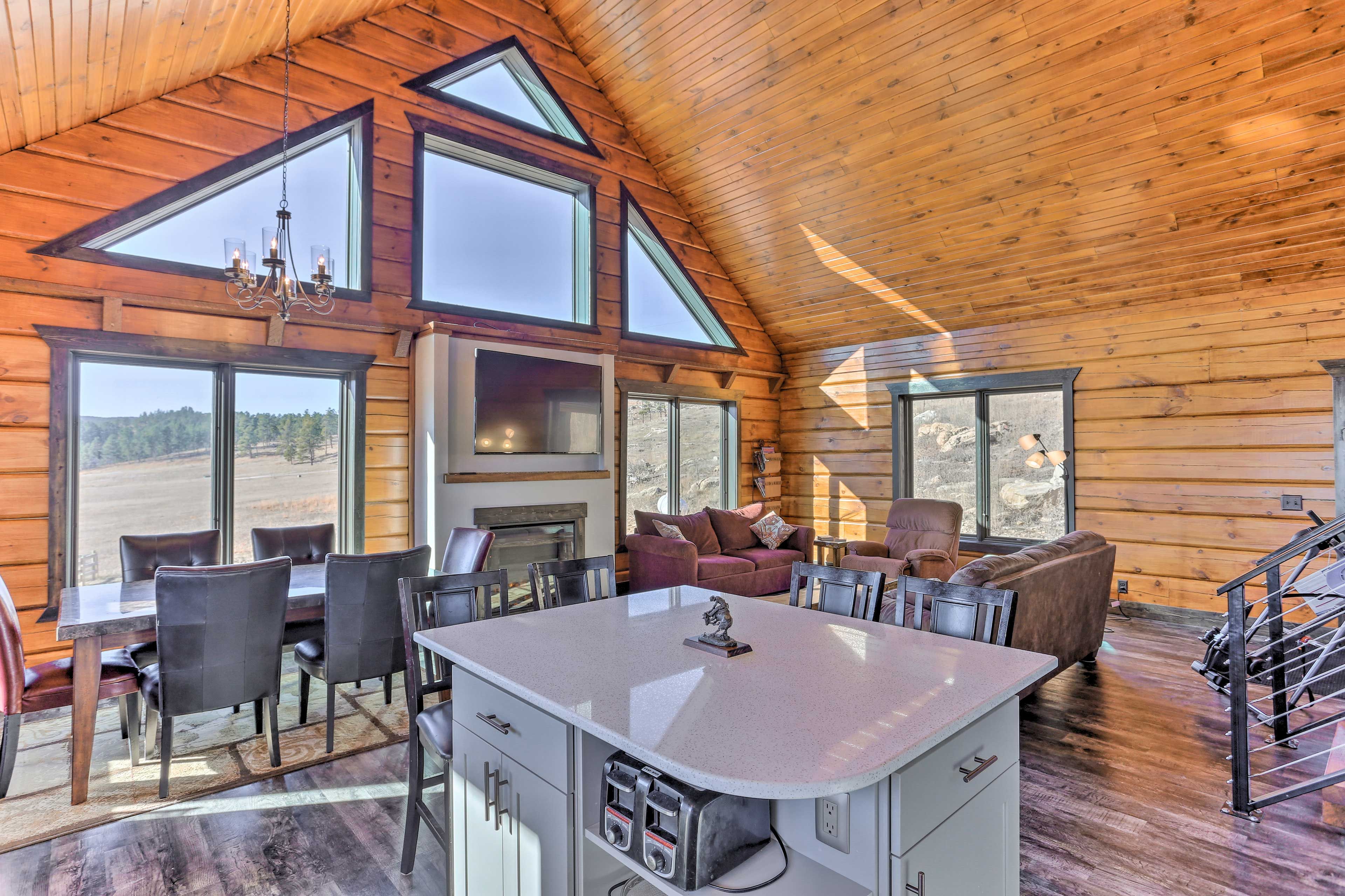 Dine at the 6-person table, or stay cozy with the electric fireplace.