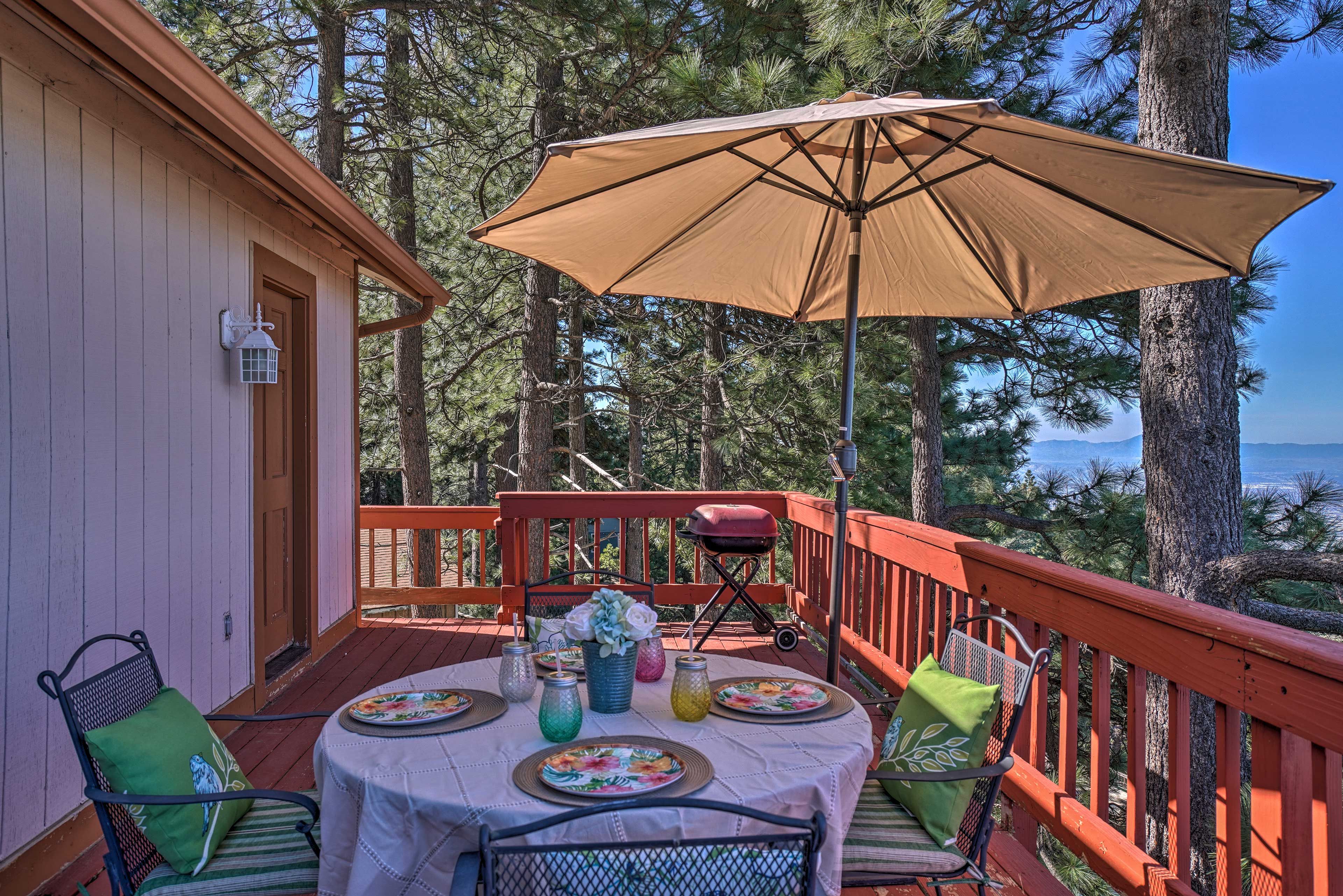 Savor your meal al fresco style at the outdoor table for 4.