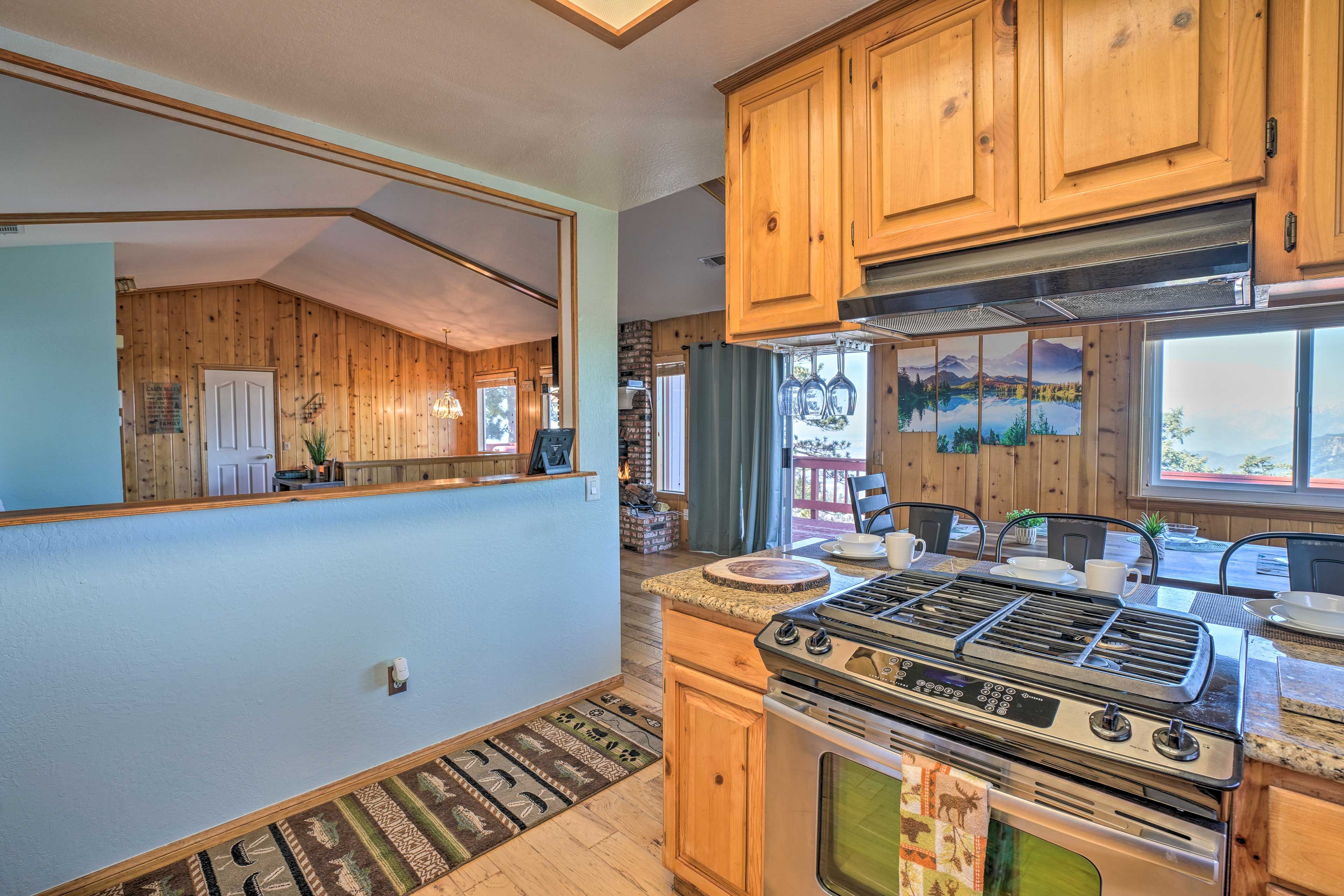 Allow yourself to be a part of the fun with an open window to the living room.
