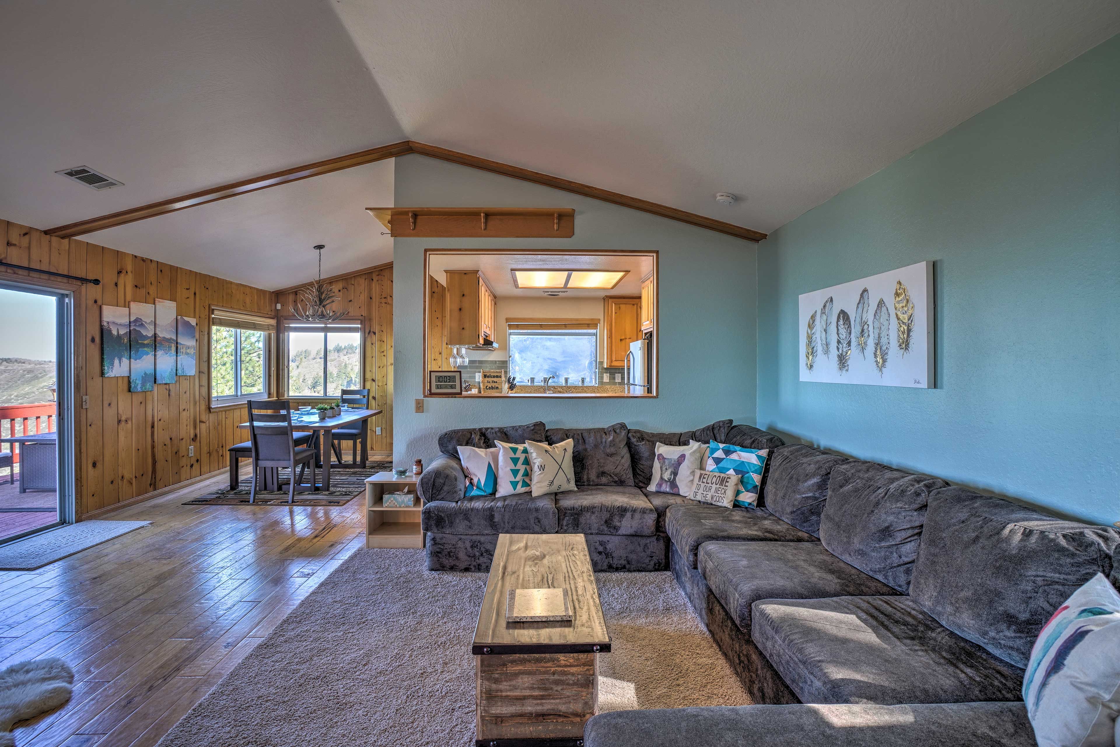 Feel elements of nature in this home with wood-adorned walls and floors.
