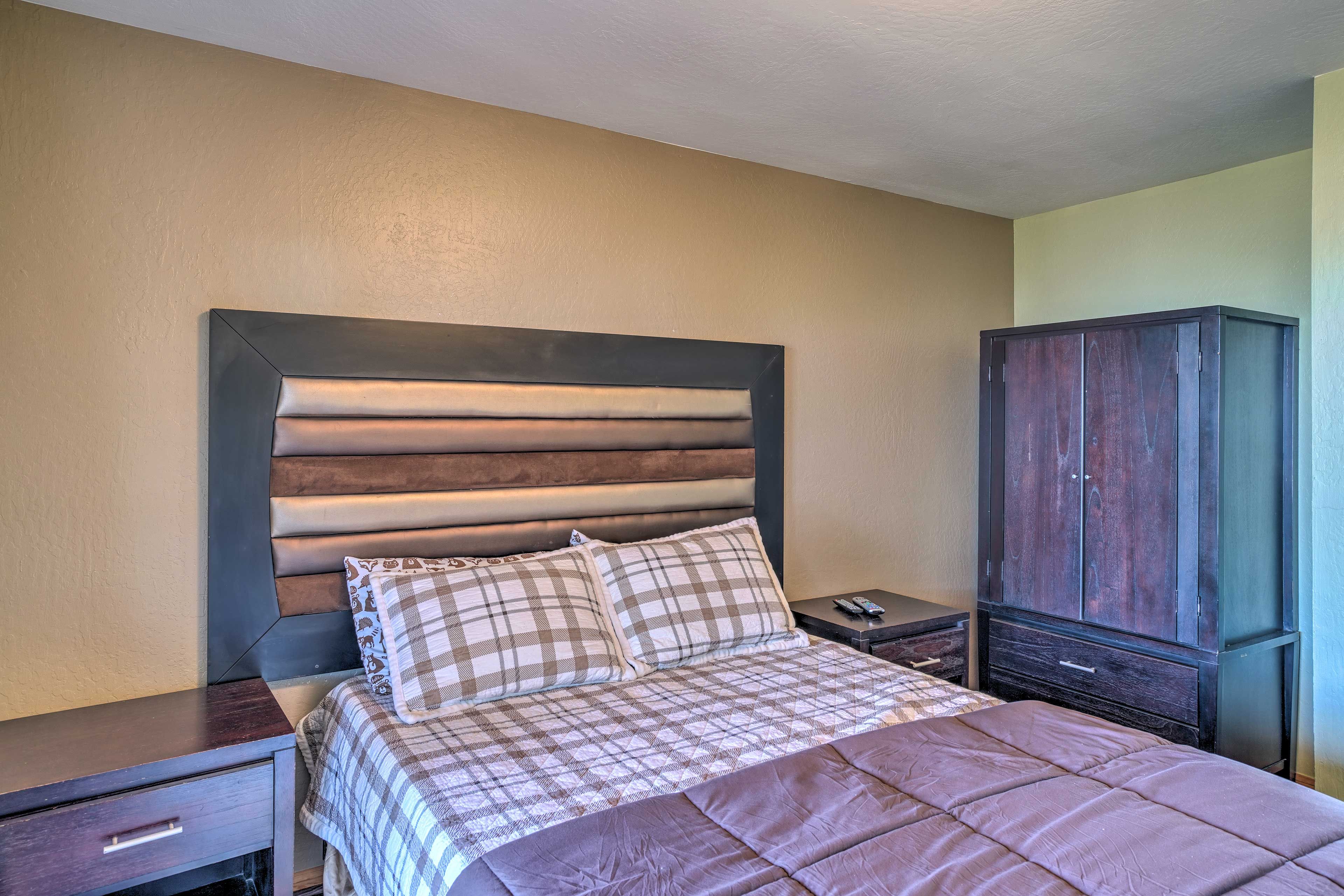This bedroom offers a full-sized bed and furnishings to match.