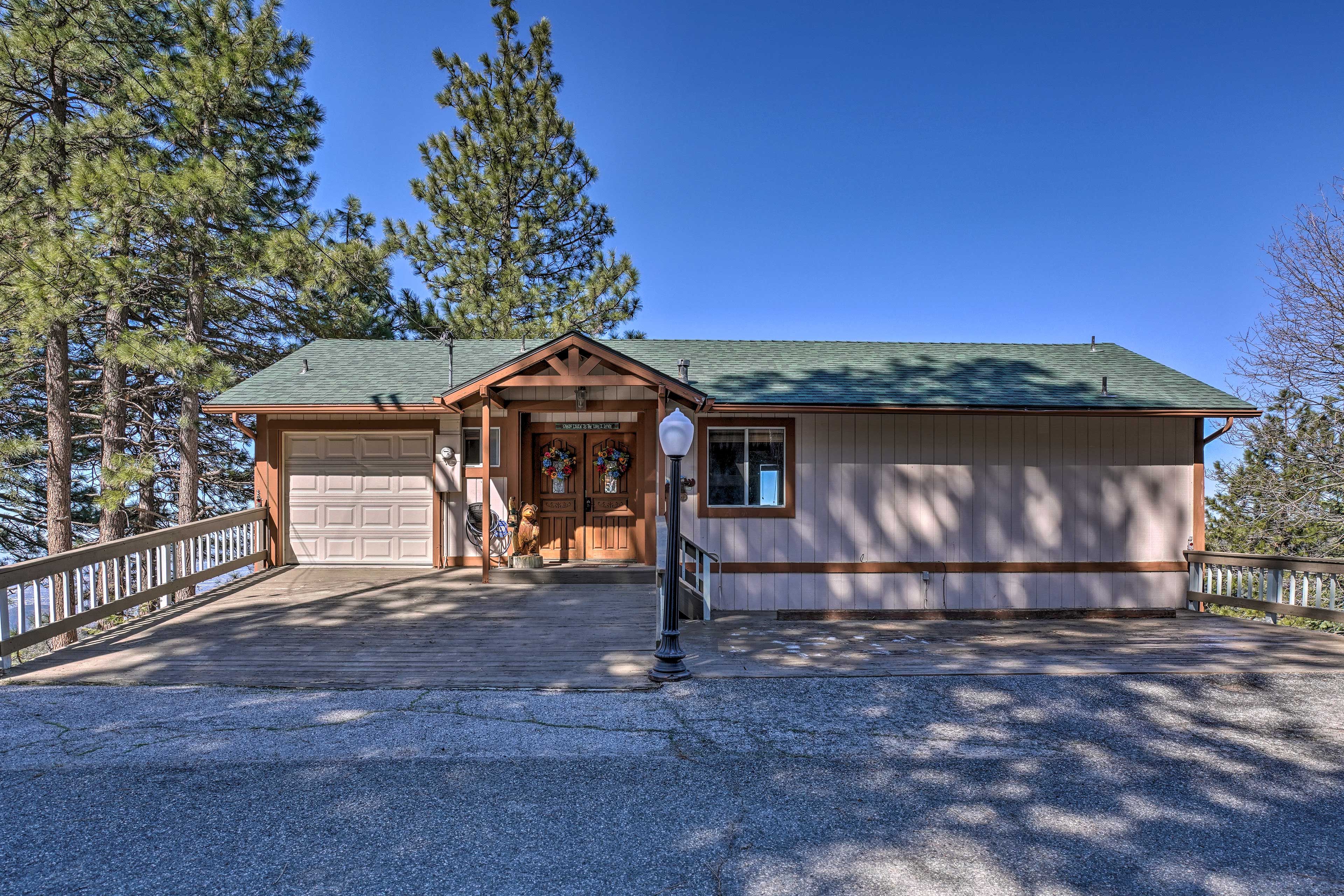 This home packs a punch in a cozy space right on the edge of Running Springs!