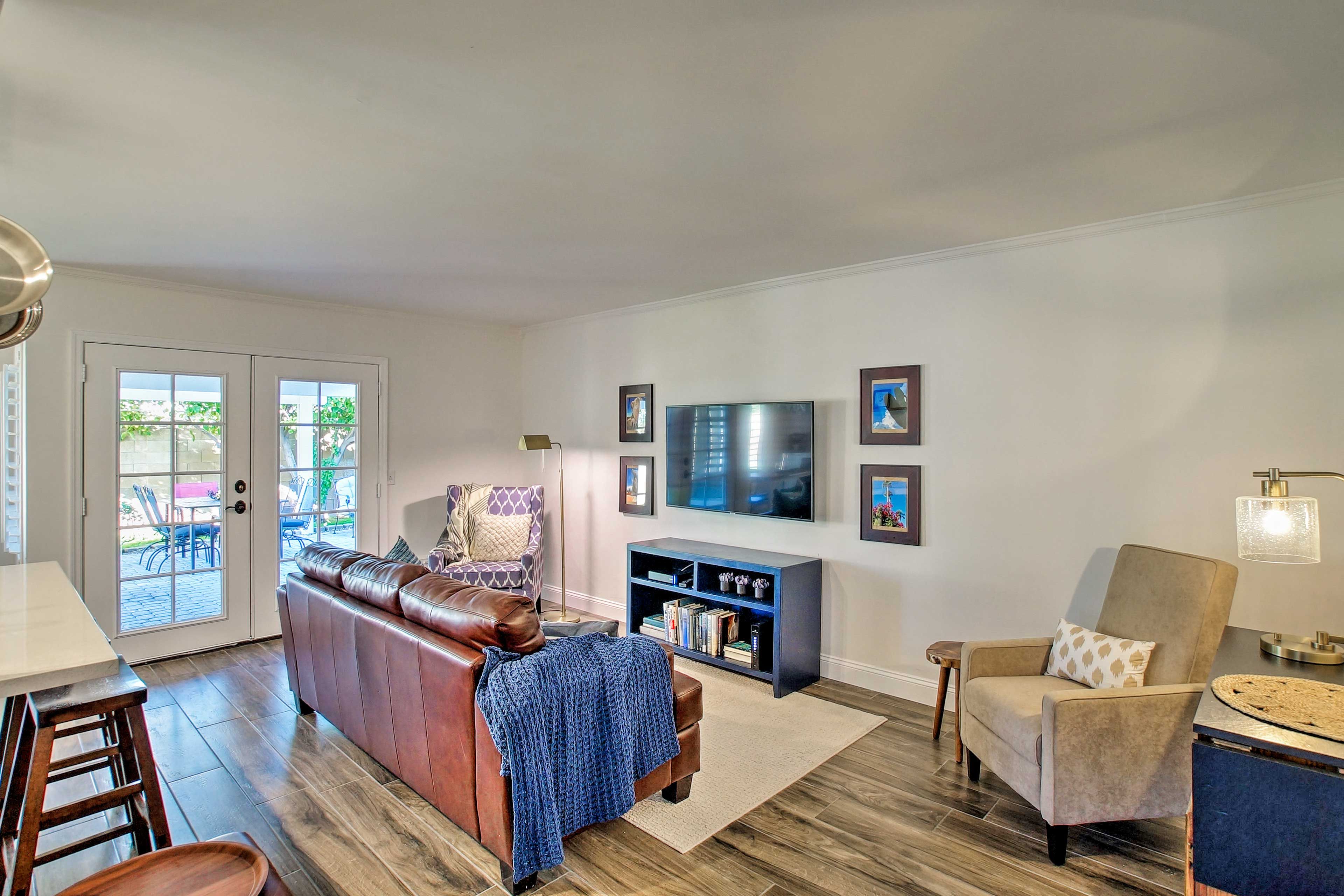 Access the furnished back patio from the living area.