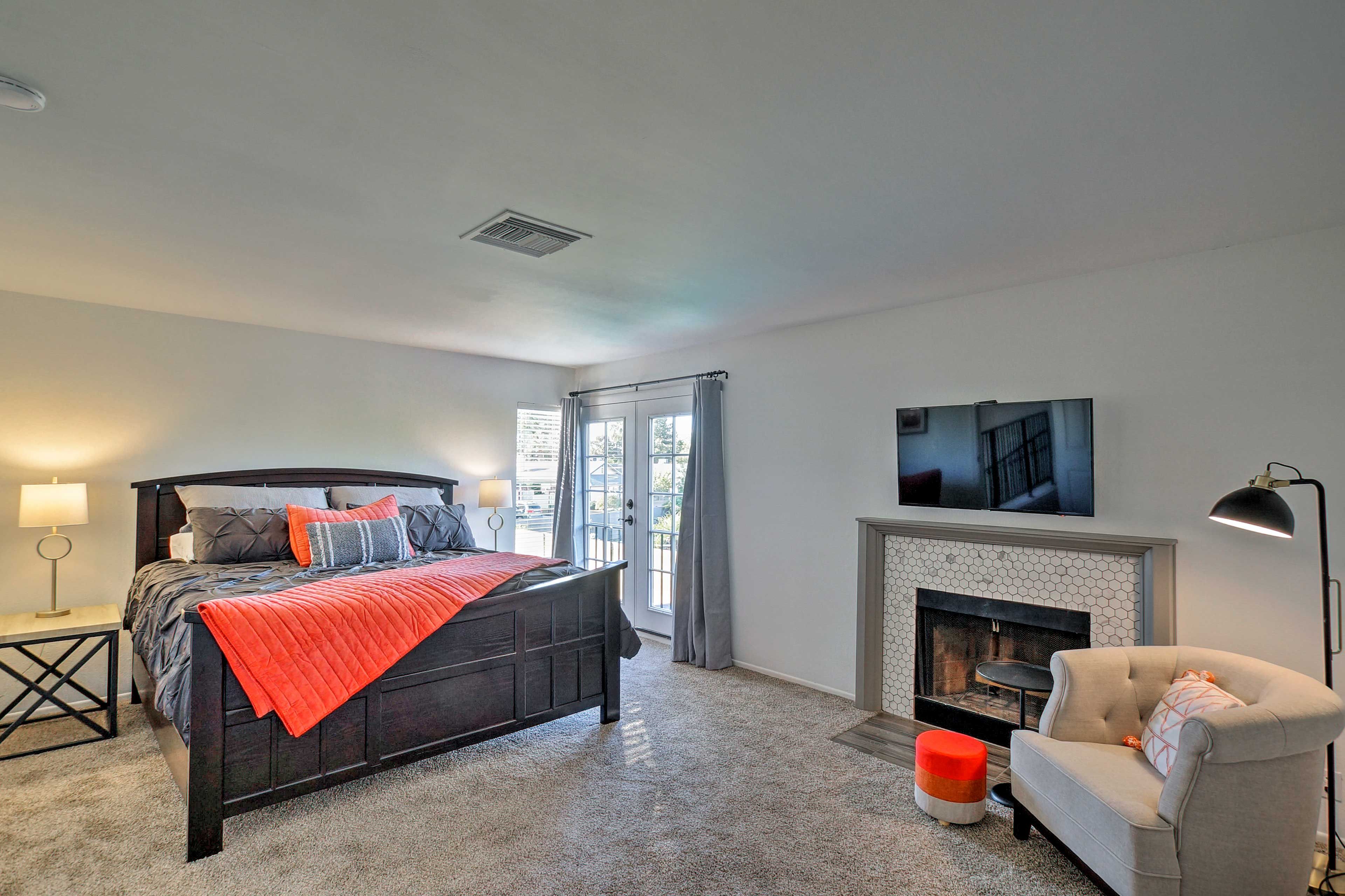 Slip under the covers of the king bed in this bedroom.
