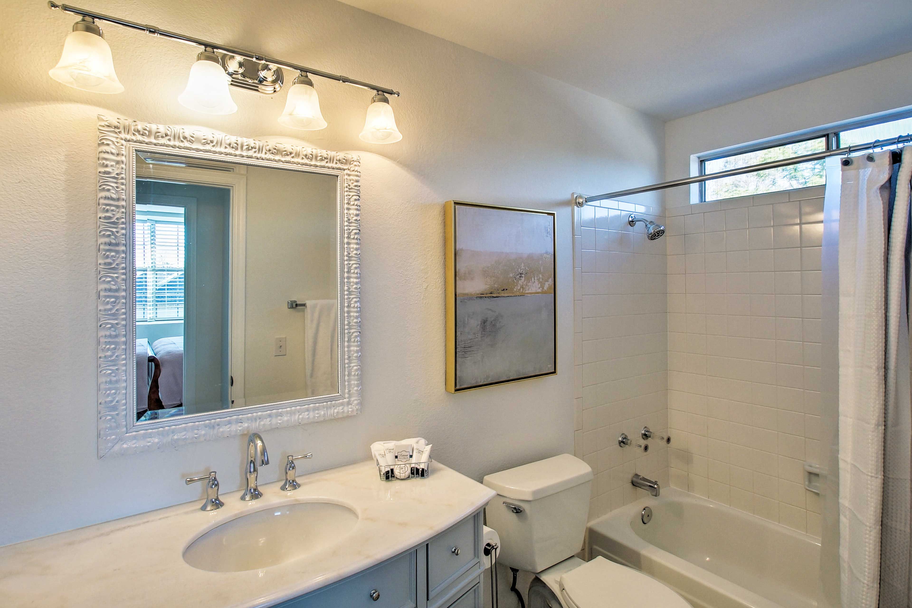 A second full bathroom provides a shower/tub combo.