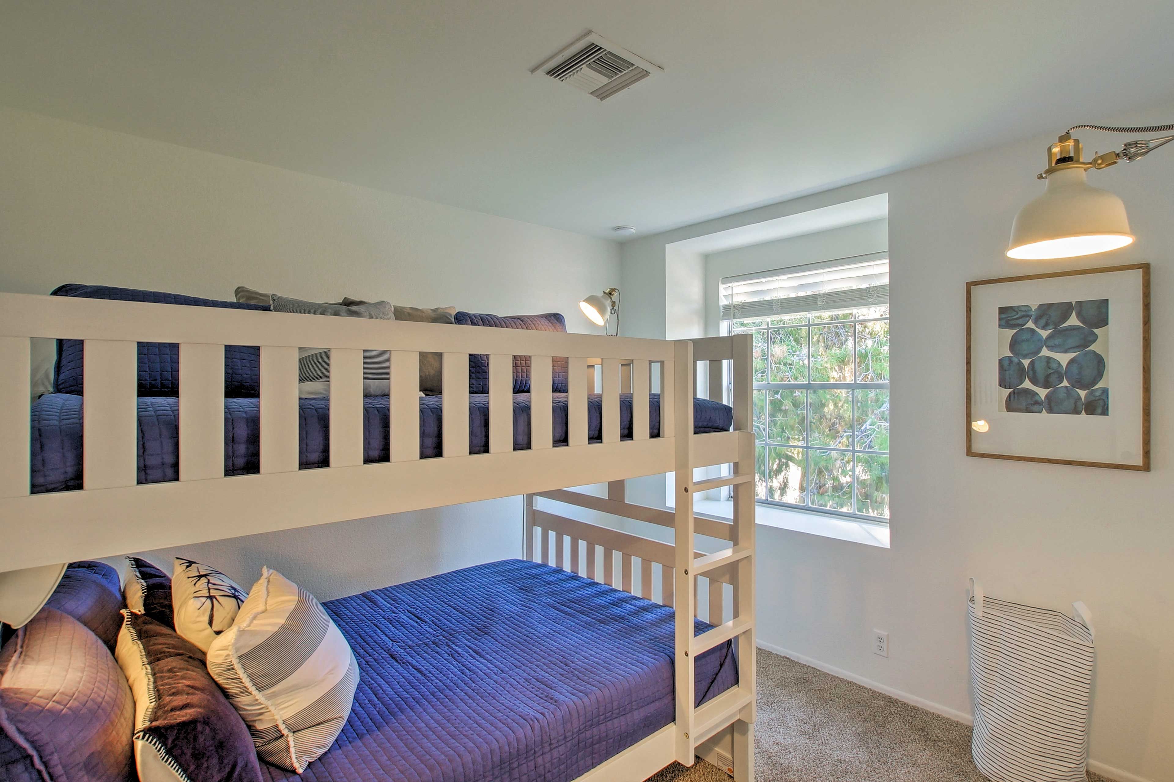 Kids love the bunk room with a full-over-full bunk bed.