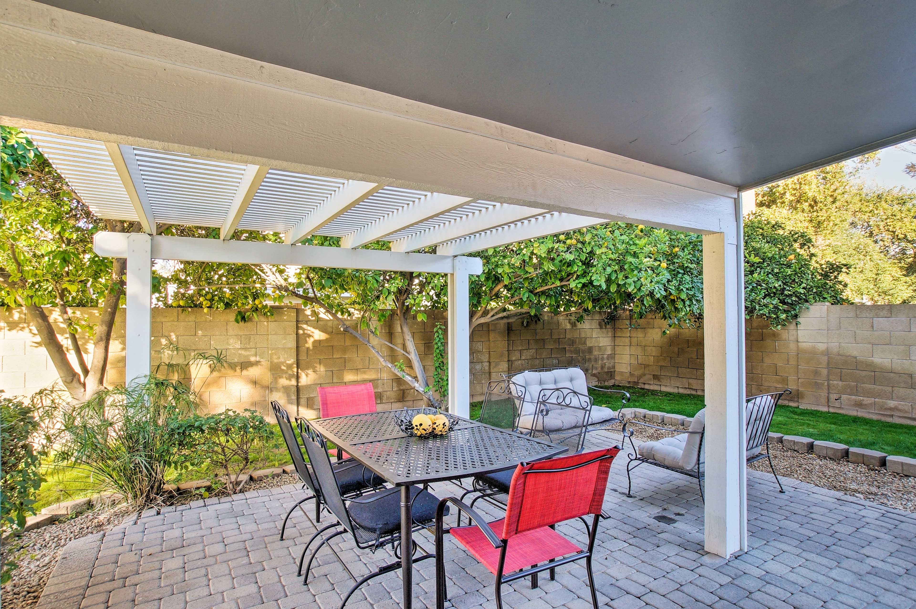 Dine al fresco on the furnished back patio.