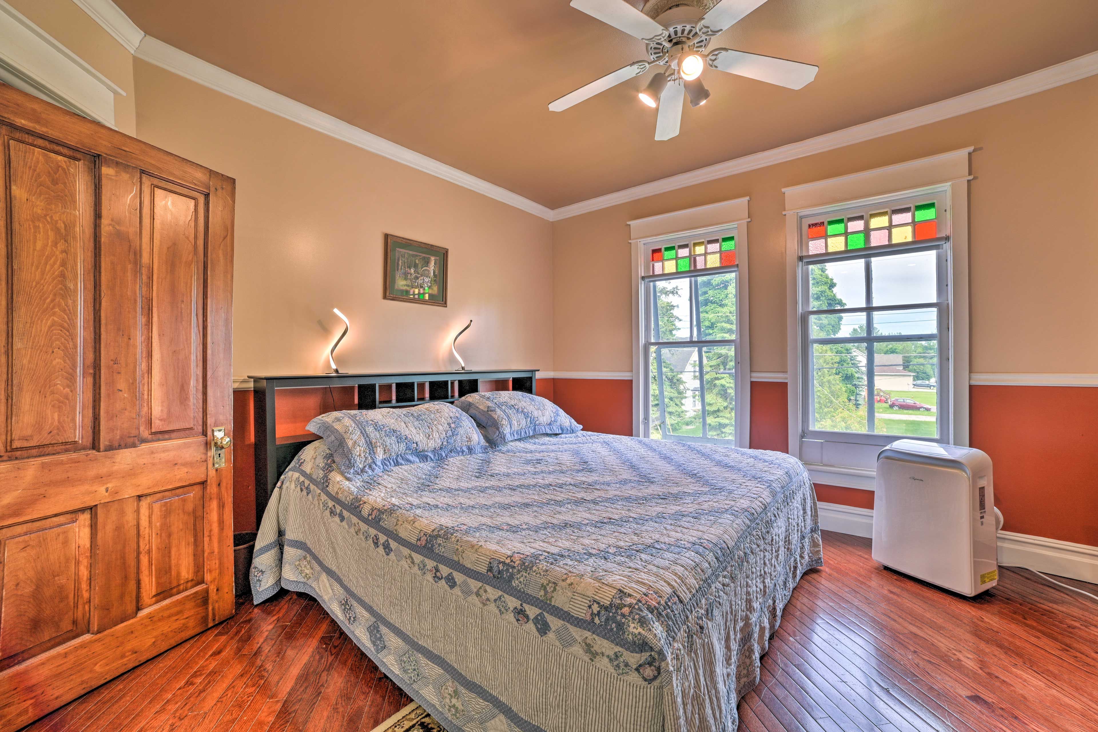 Bedroom 1 | King Bed | Electric Fireplace | En-Suite Bathroom | 1st Floor