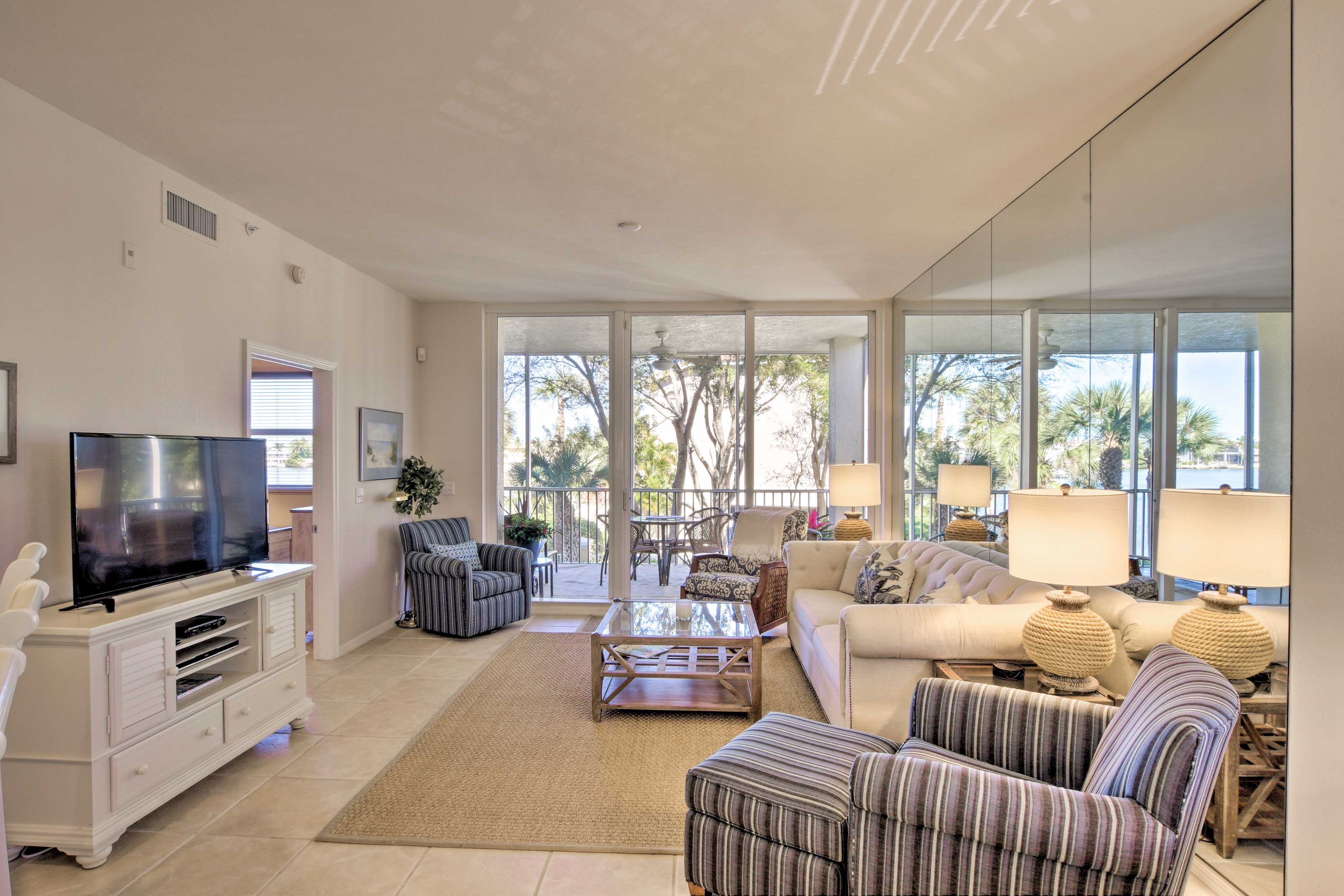Snag a spot on the sofa while a DVD plays on the flat-screen TV!