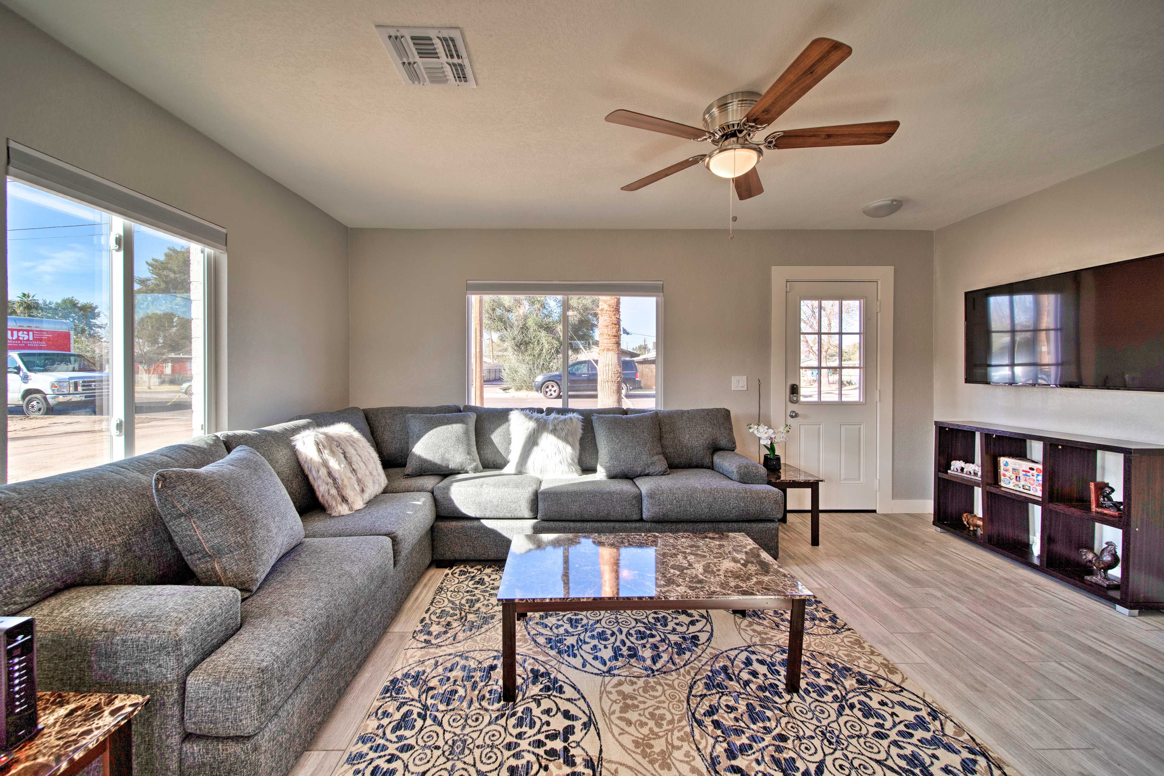 Relax on the couch and watch the flat-screen Smart TV.