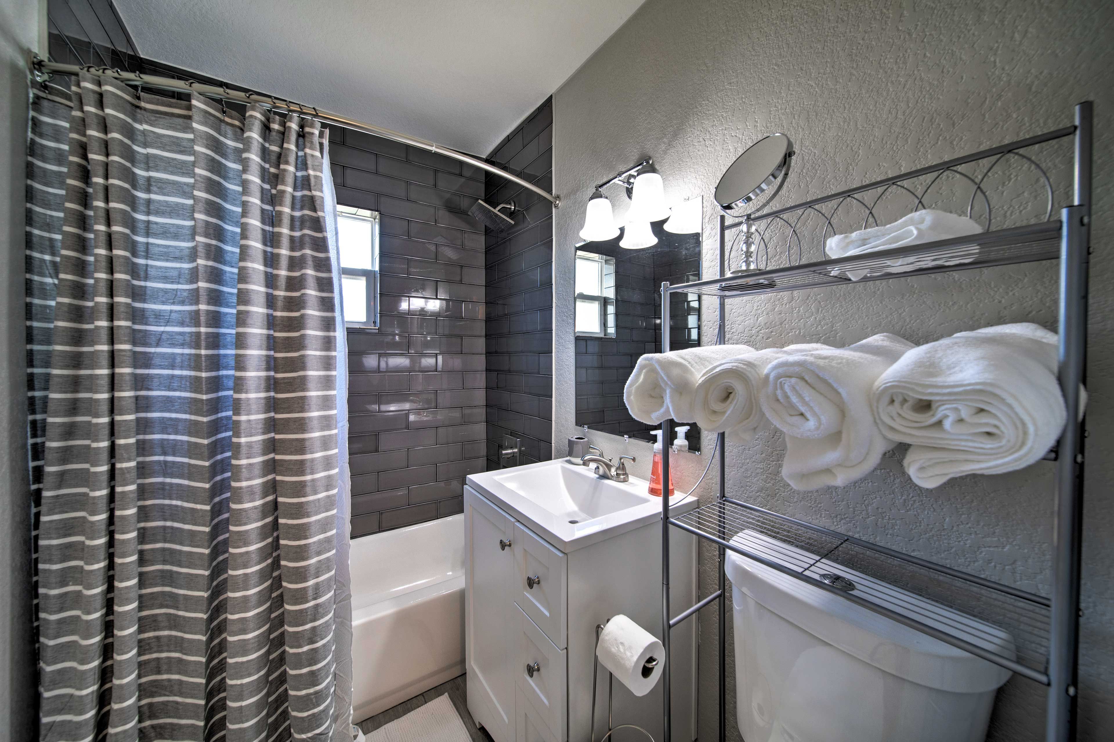 Rinse off the day in the shower/tub combo.