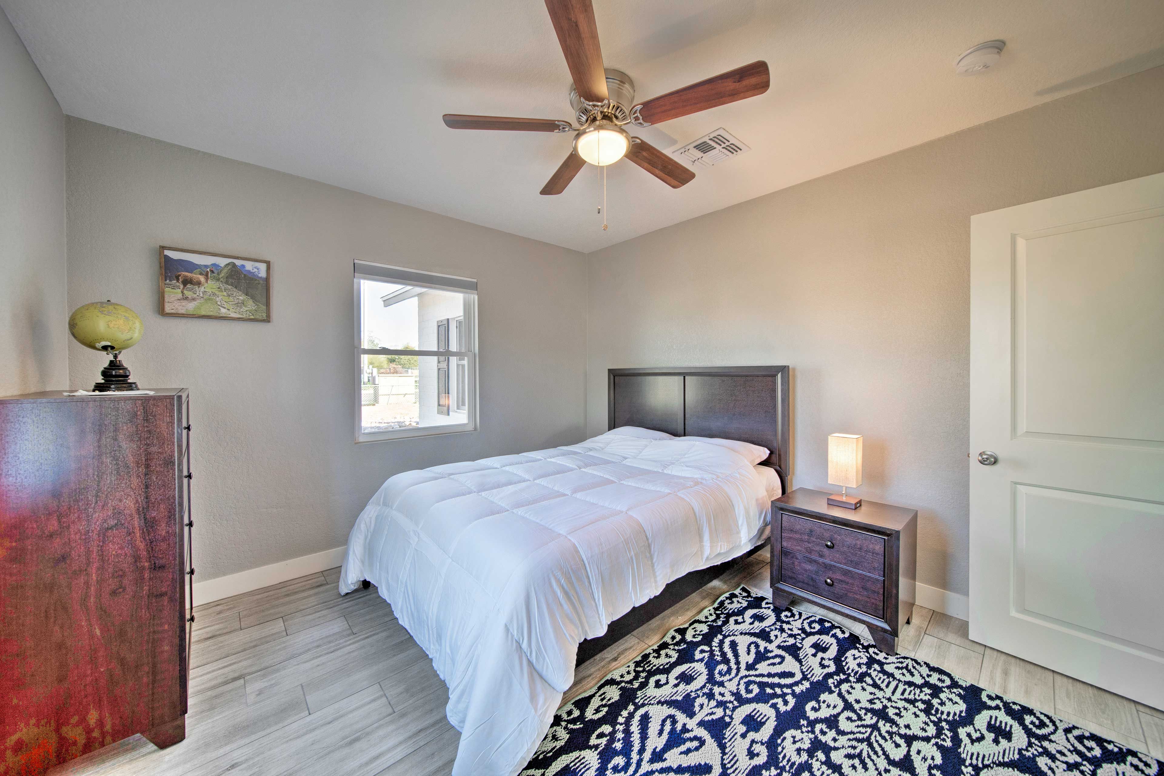 The second bedroom houses a queen bed.