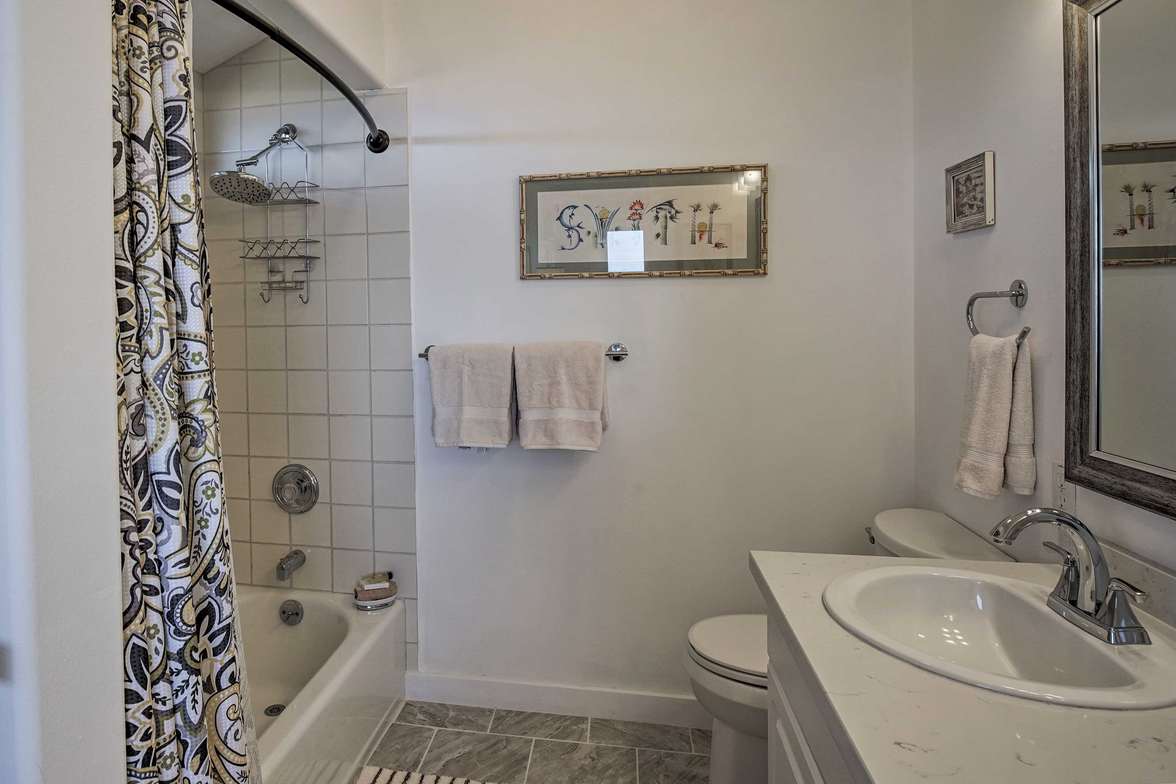 Rinse off in the shower/tub combo before crawling under the covers.