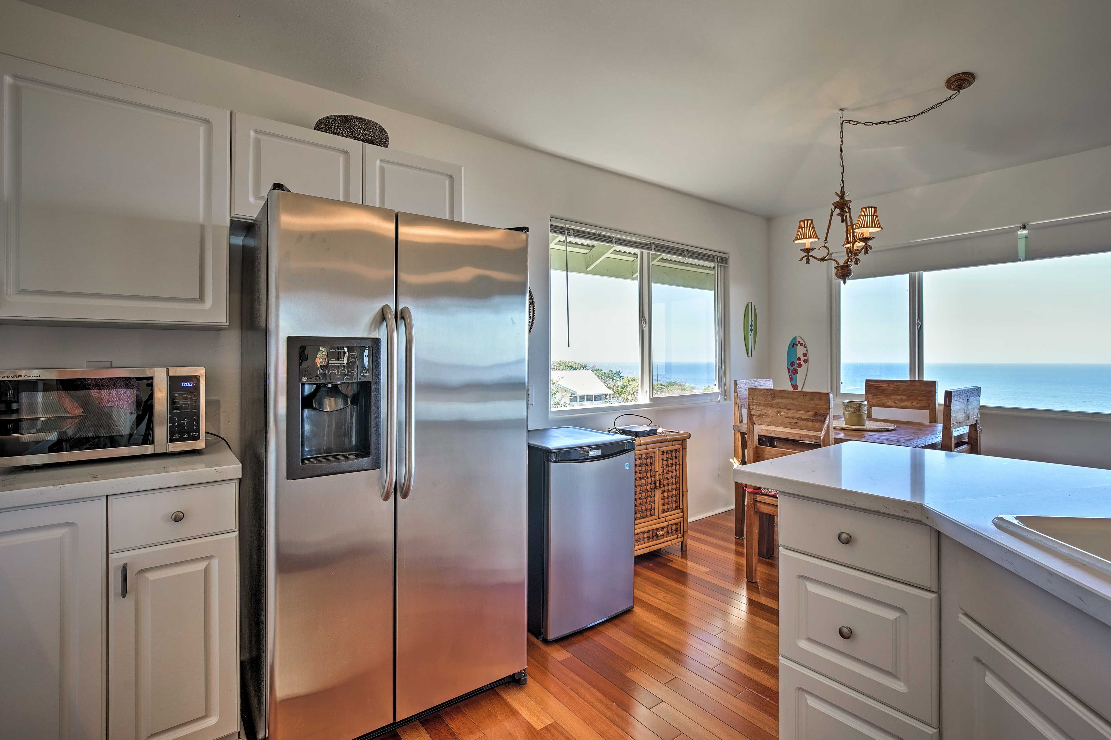 This space offers stainless steel appliances and long countertops.