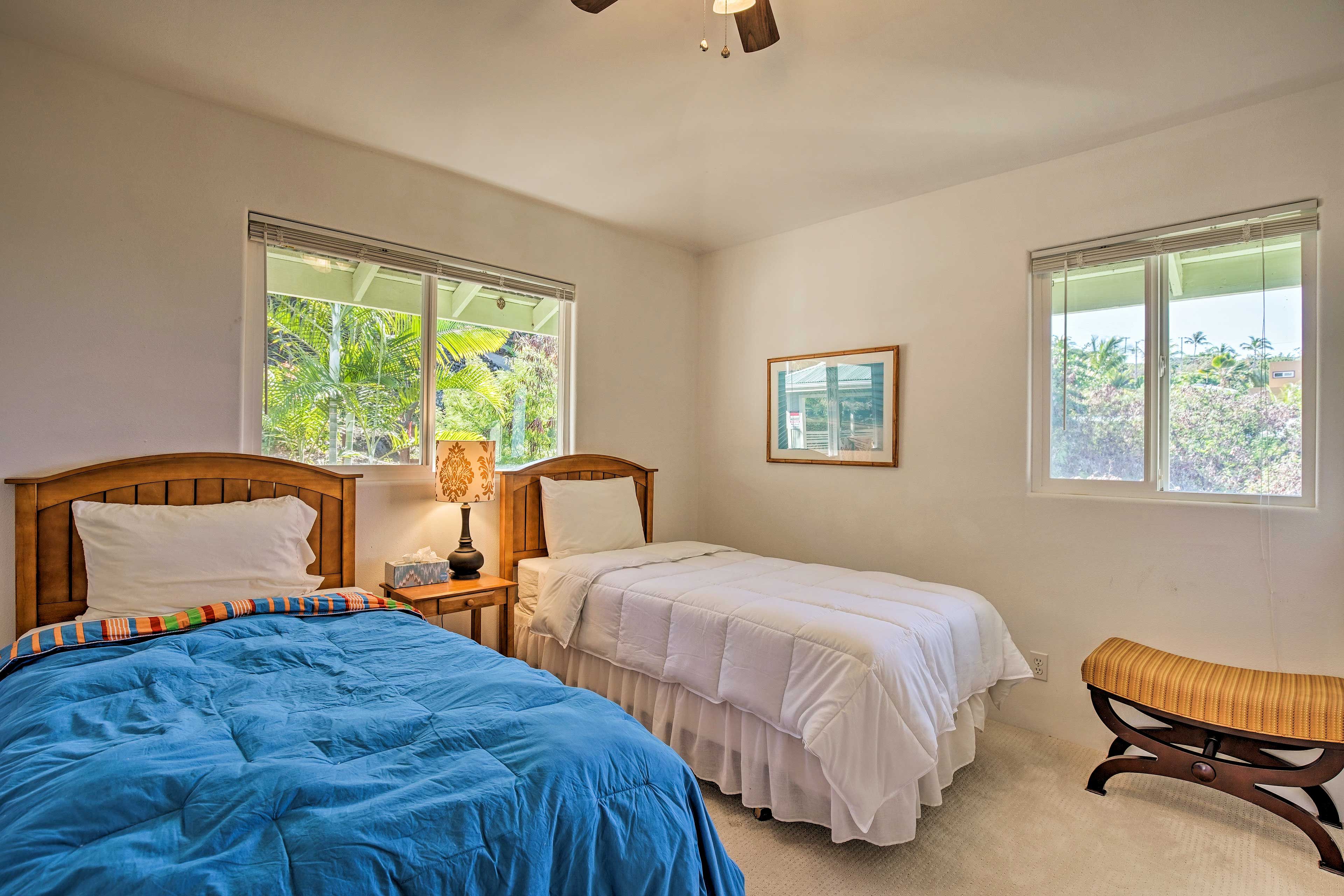 Bedroom 2 offers 2 twin beds.