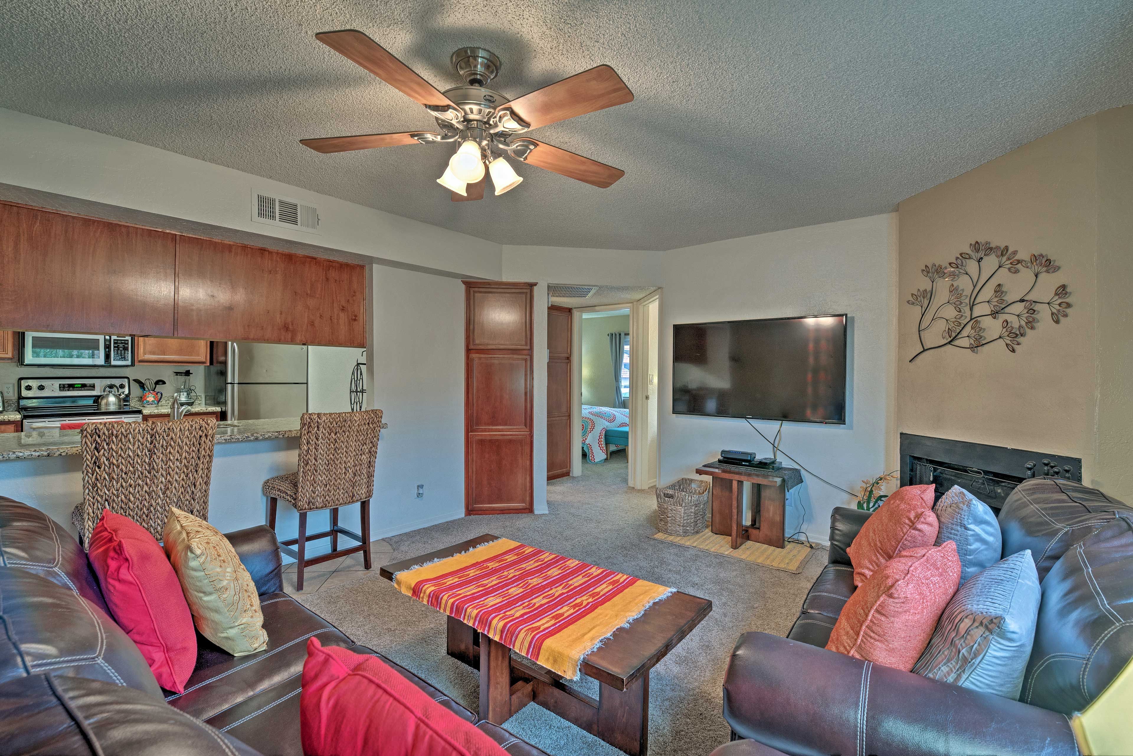 With a high-top bar, the living room flows organically into the kitchen!