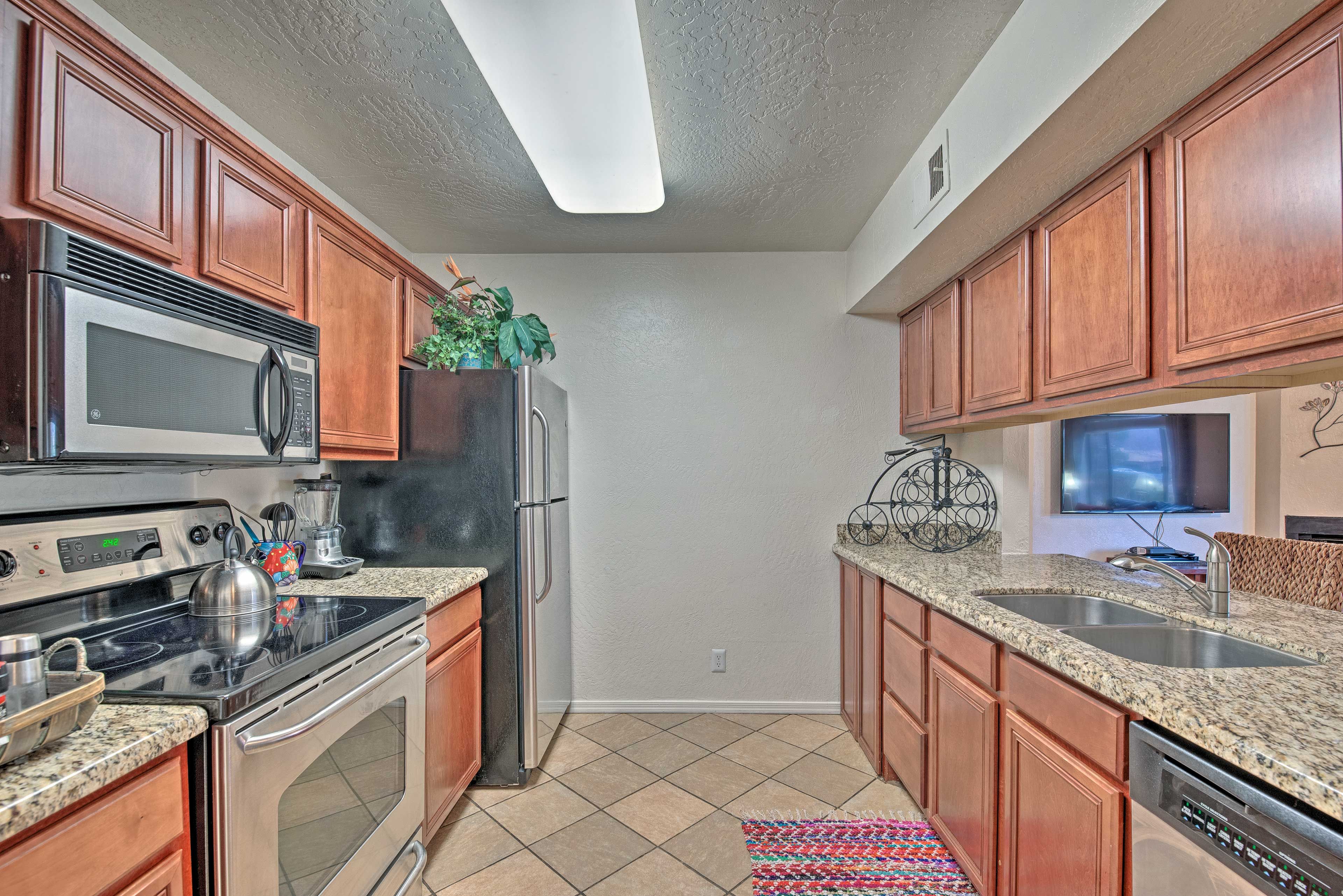 The kitchen is fully equipped with cookware, utensils, and appliances!