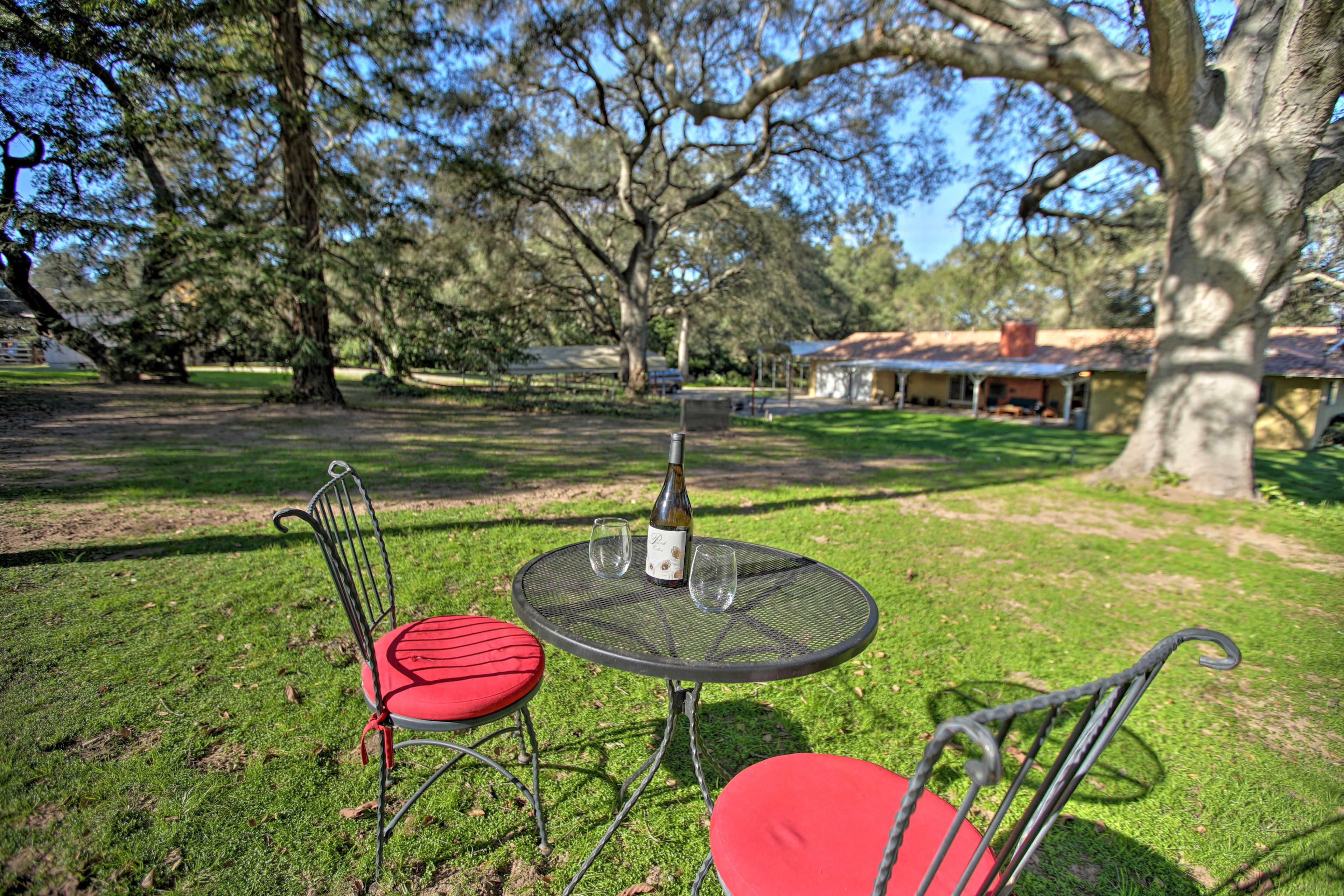Enjoy wine at the bistro table.