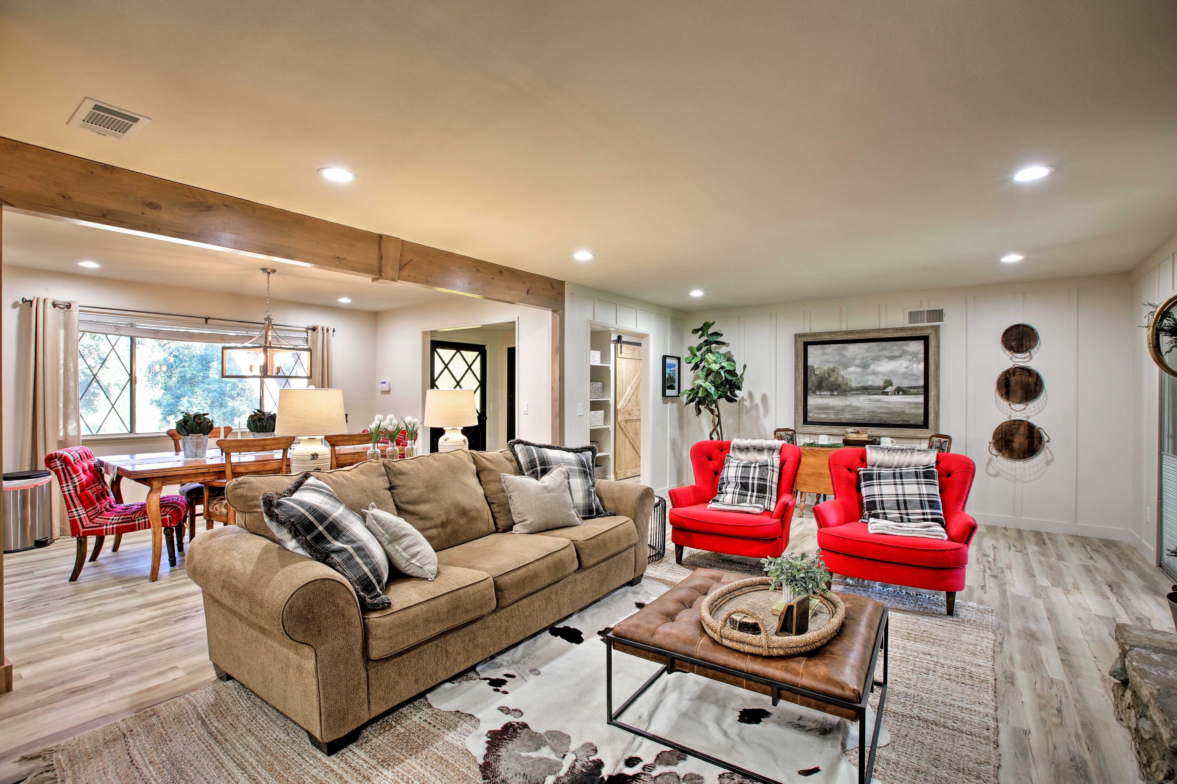 Watch a show on the flat-screen TV while relaxing in the chic living room.
