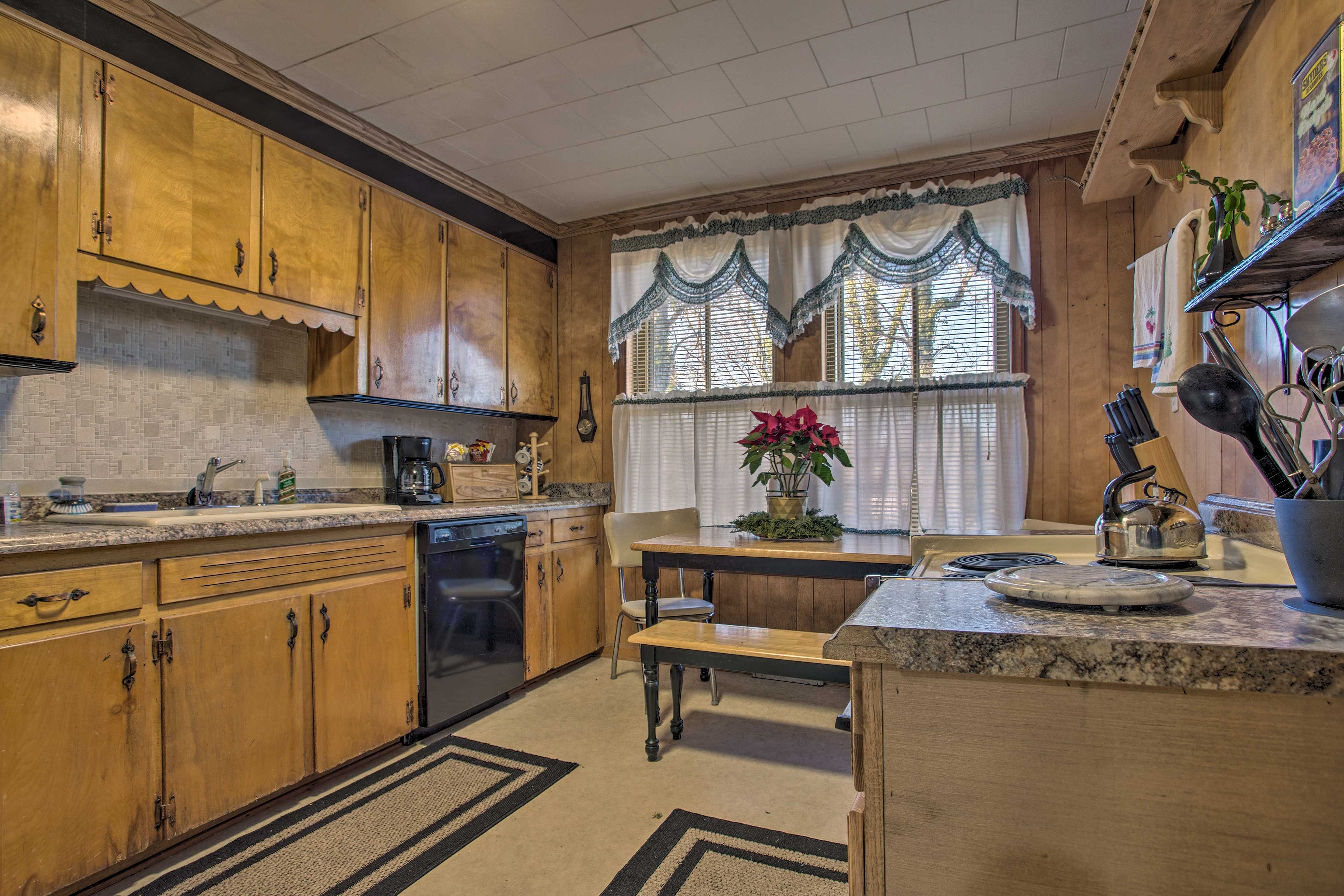 The kitchen is fully equipped with updated appliances.