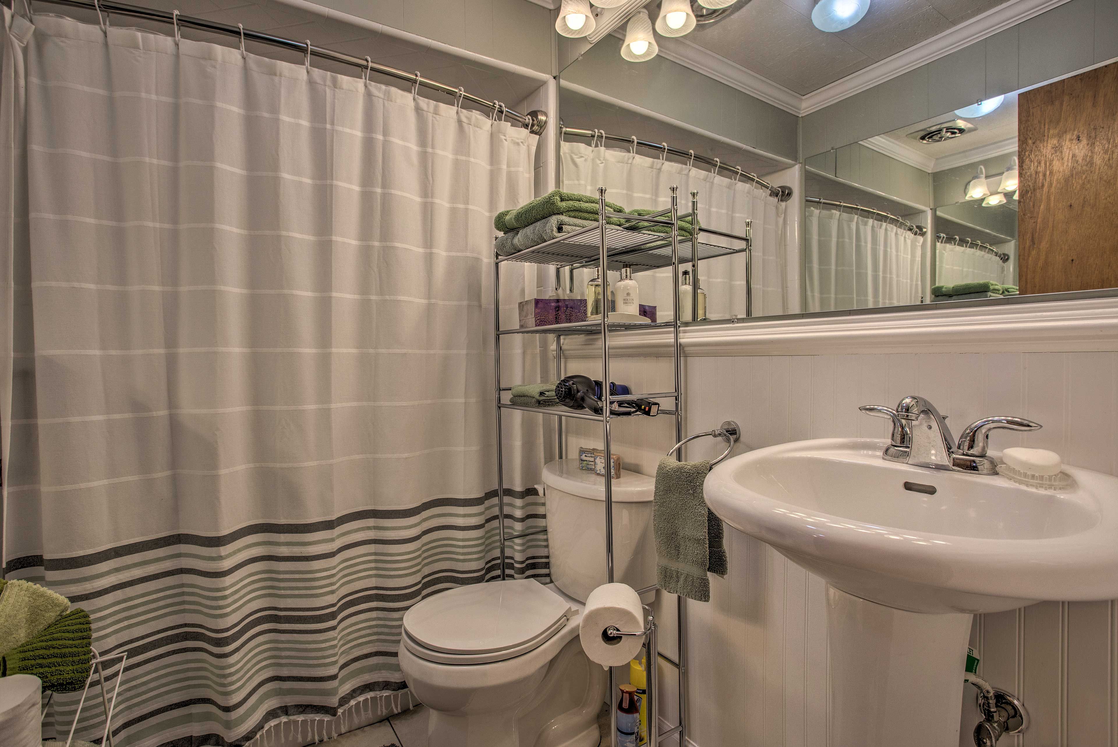 Rinse off in this shower/tub combo.