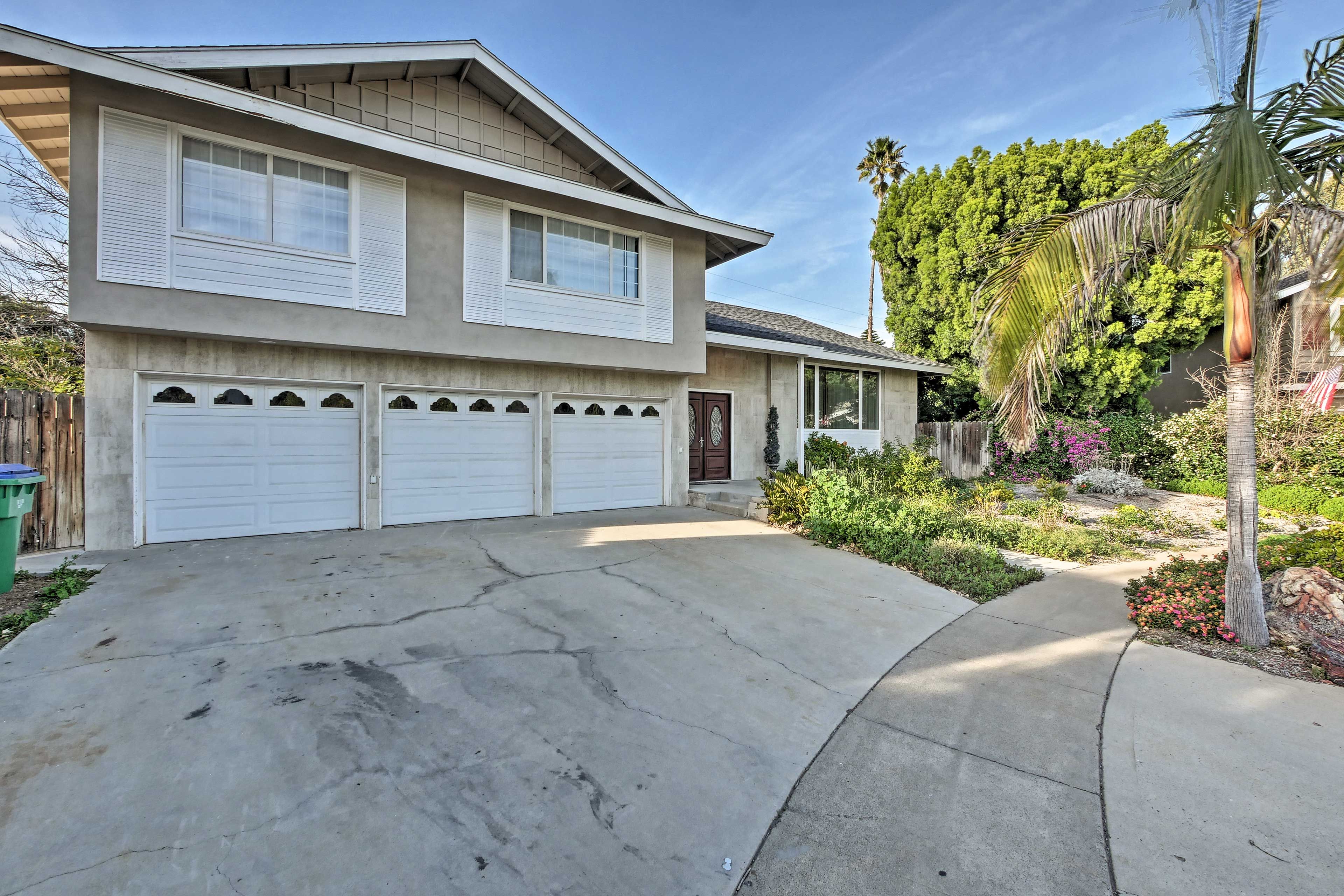 Up to 3 cars can park in the spacious driveway.