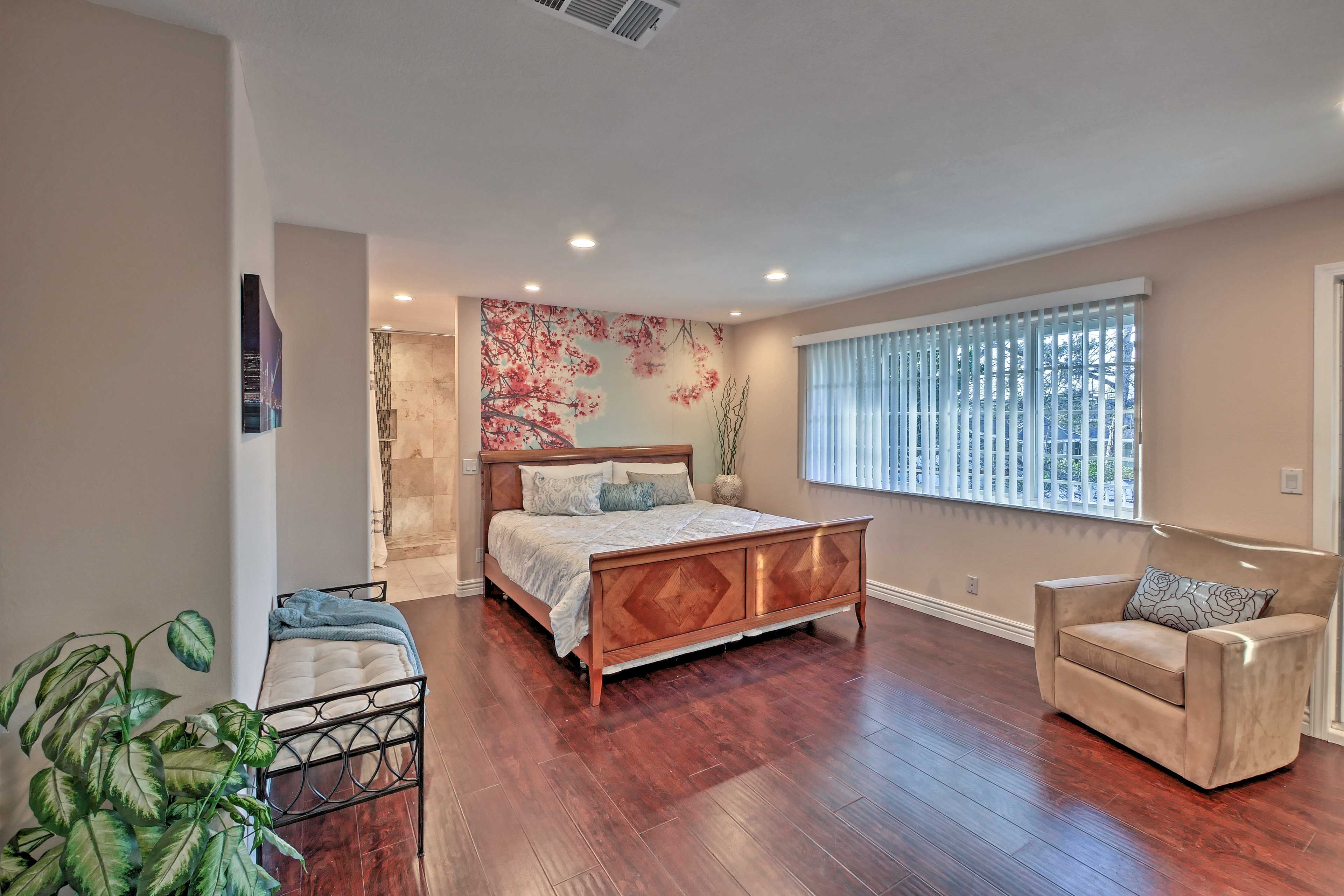 This bedroom features a king bed and en-suite bathroom.