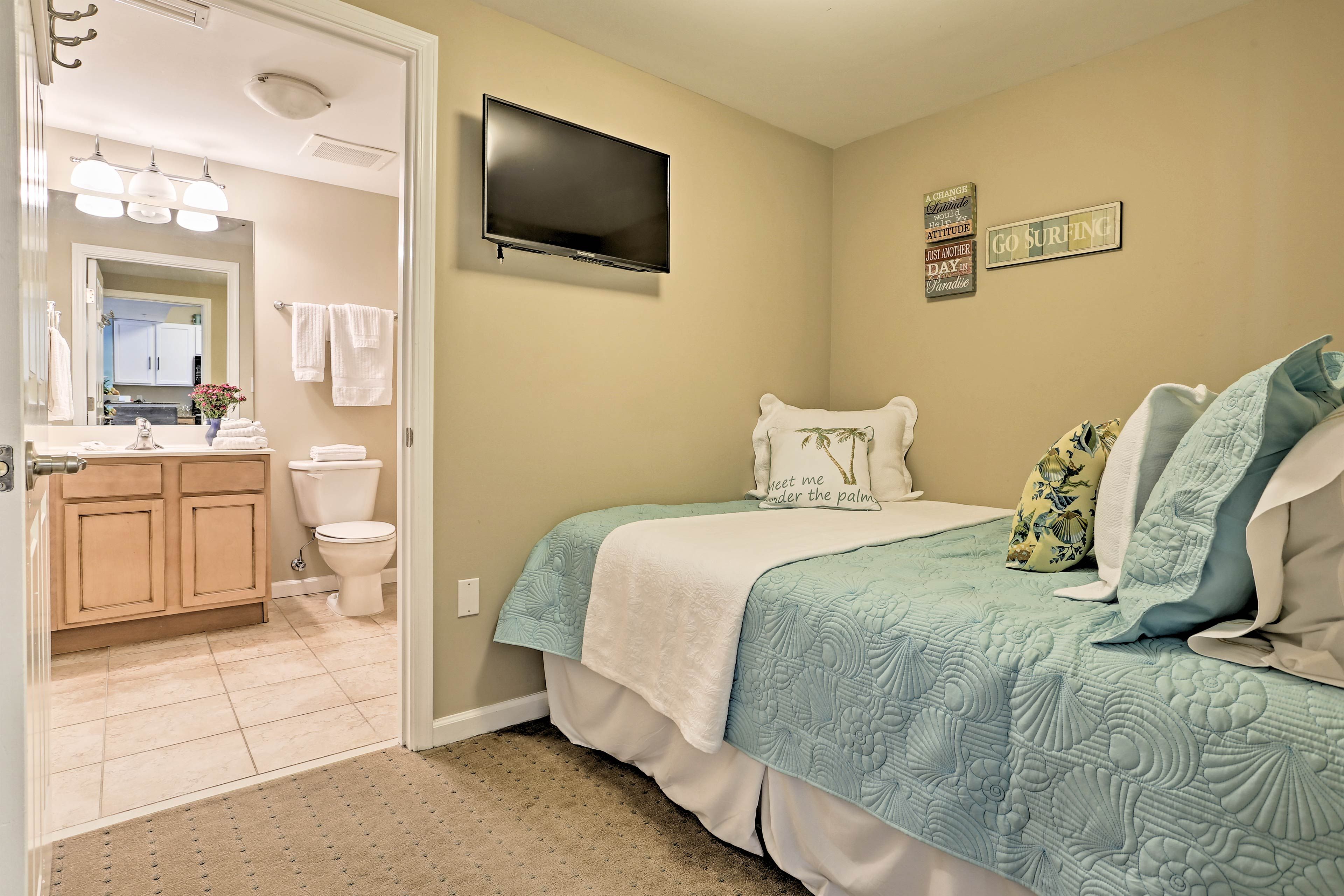 With a mounted flat-screen TV, late-night entertainment is at your fingertips!
