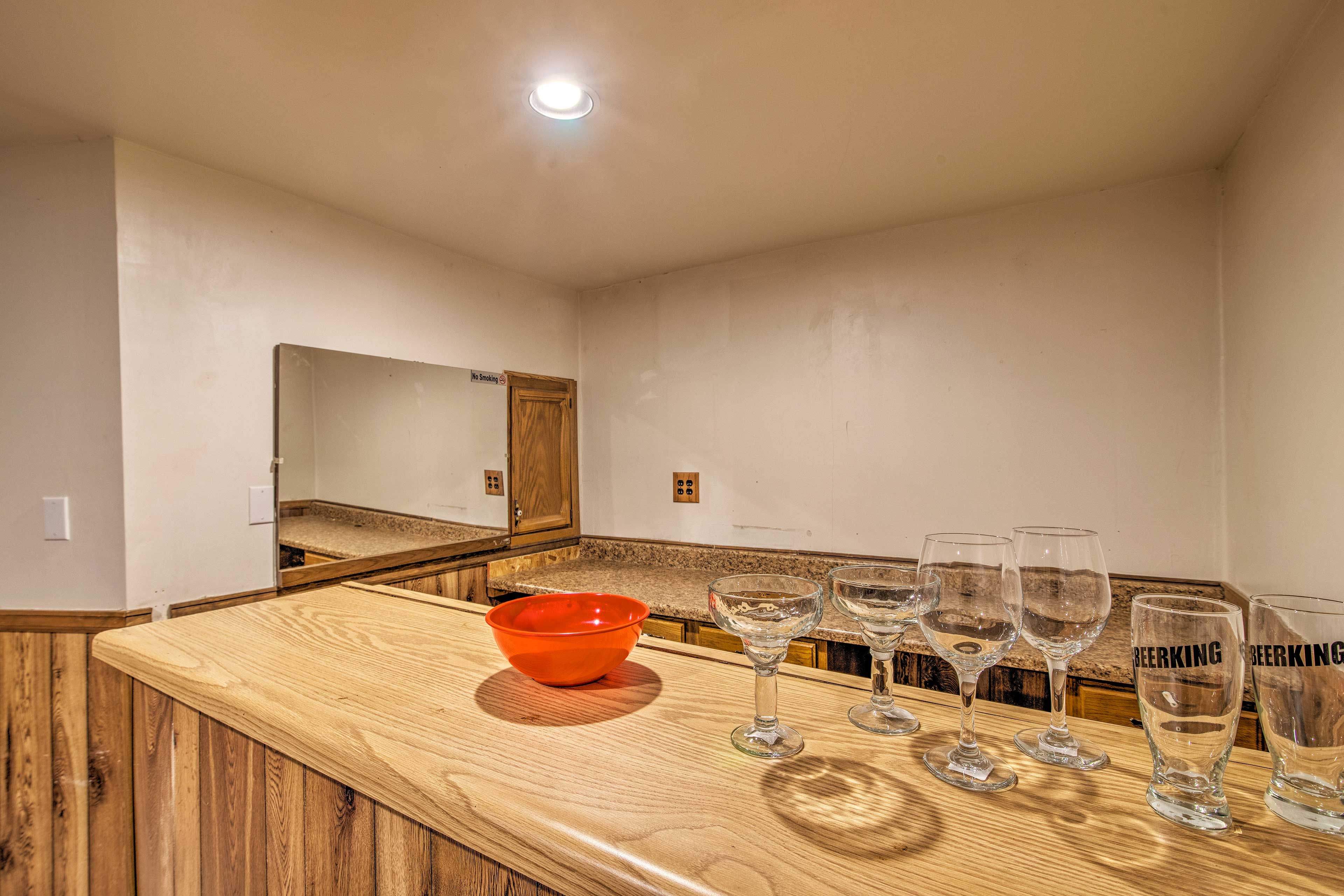 Pour yourself a tasty beverage at the wet bar.