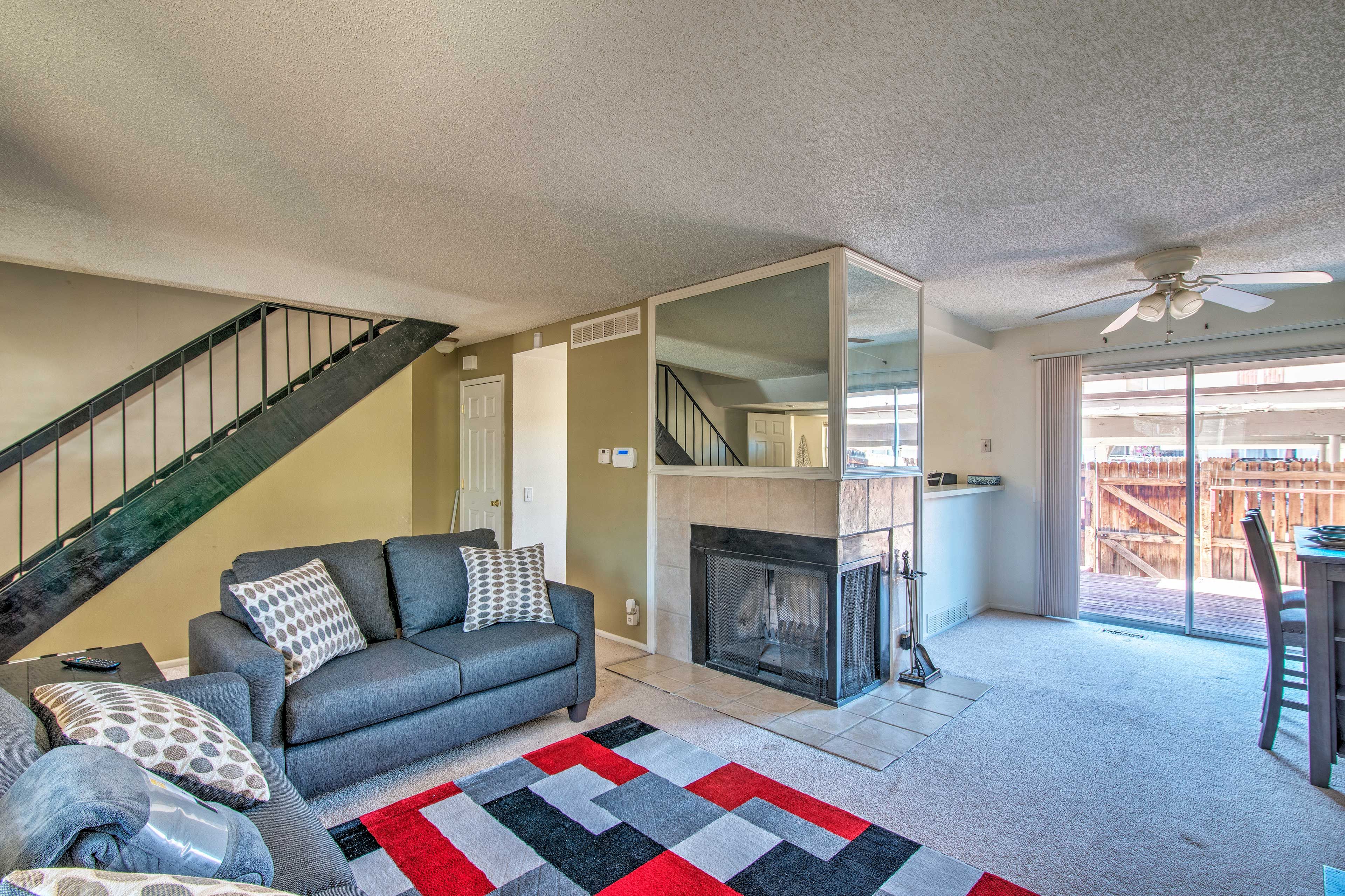 This vacation rental offers minimalist styling and a wood-burning fireplace.