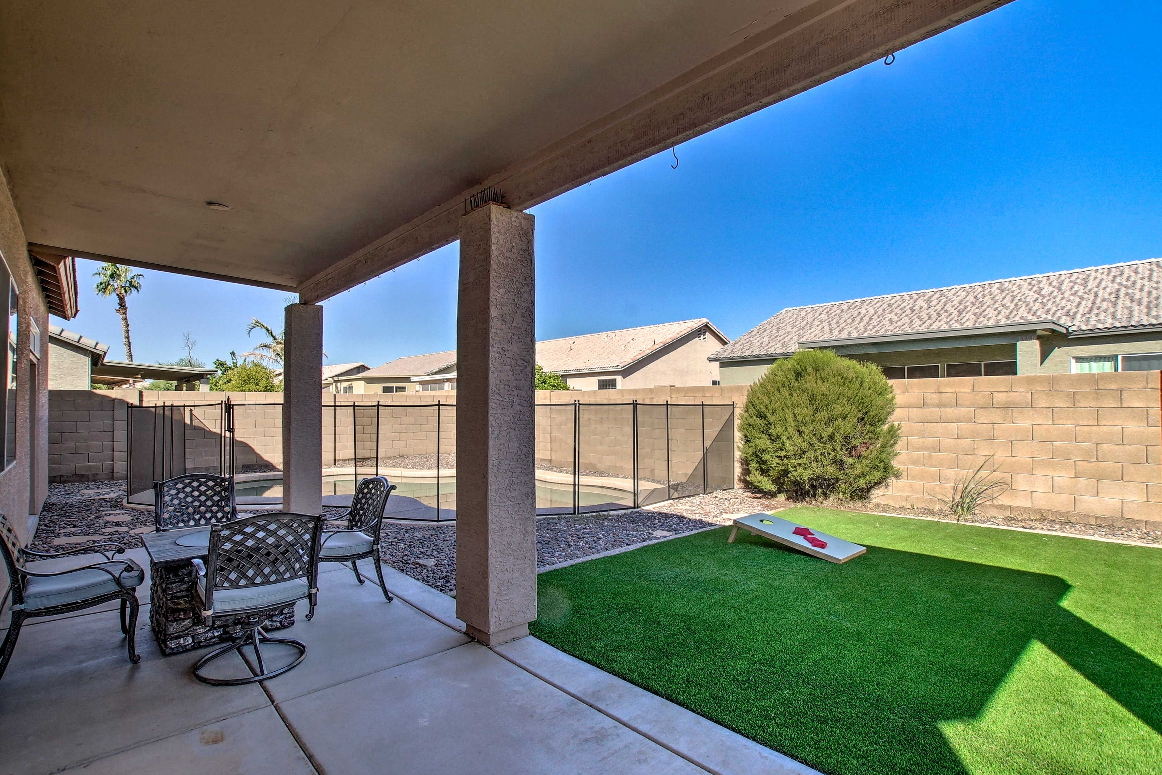 Soak up the sun in the backyard.