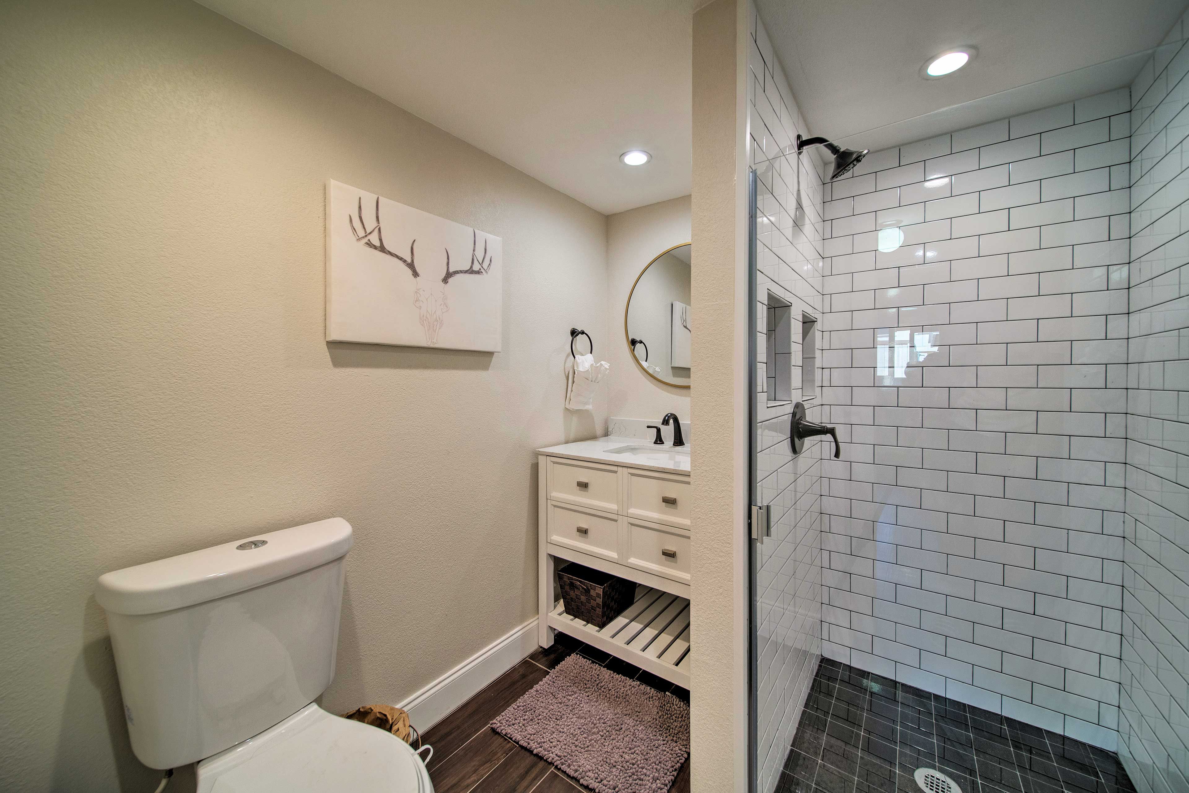 A third full bathroom is available next to the laundry room on the main floor.