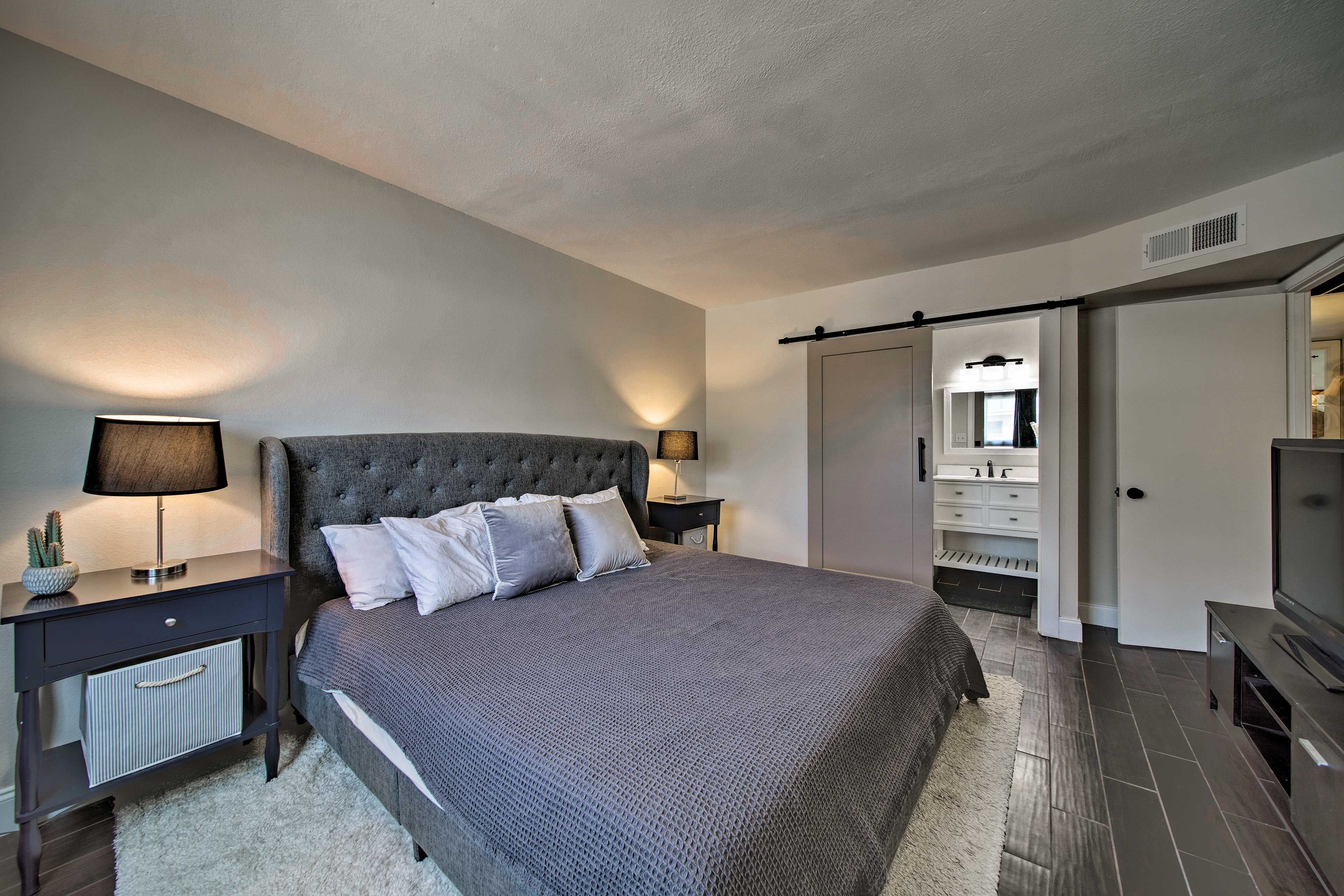 Sink into the California king bed after freshening up in the en-suite bathroom.