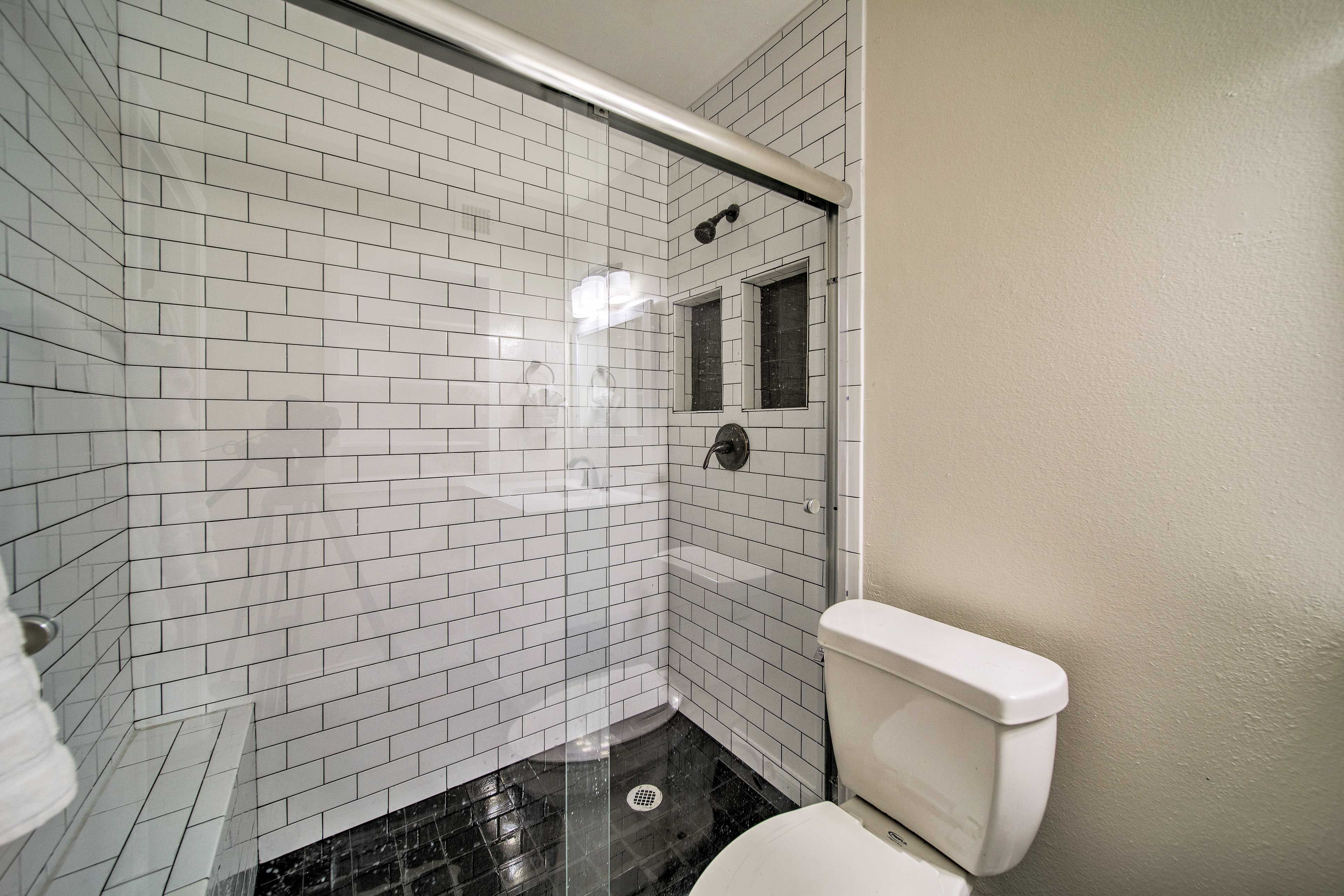 The tile-lined stand-up shower is gorgeous.