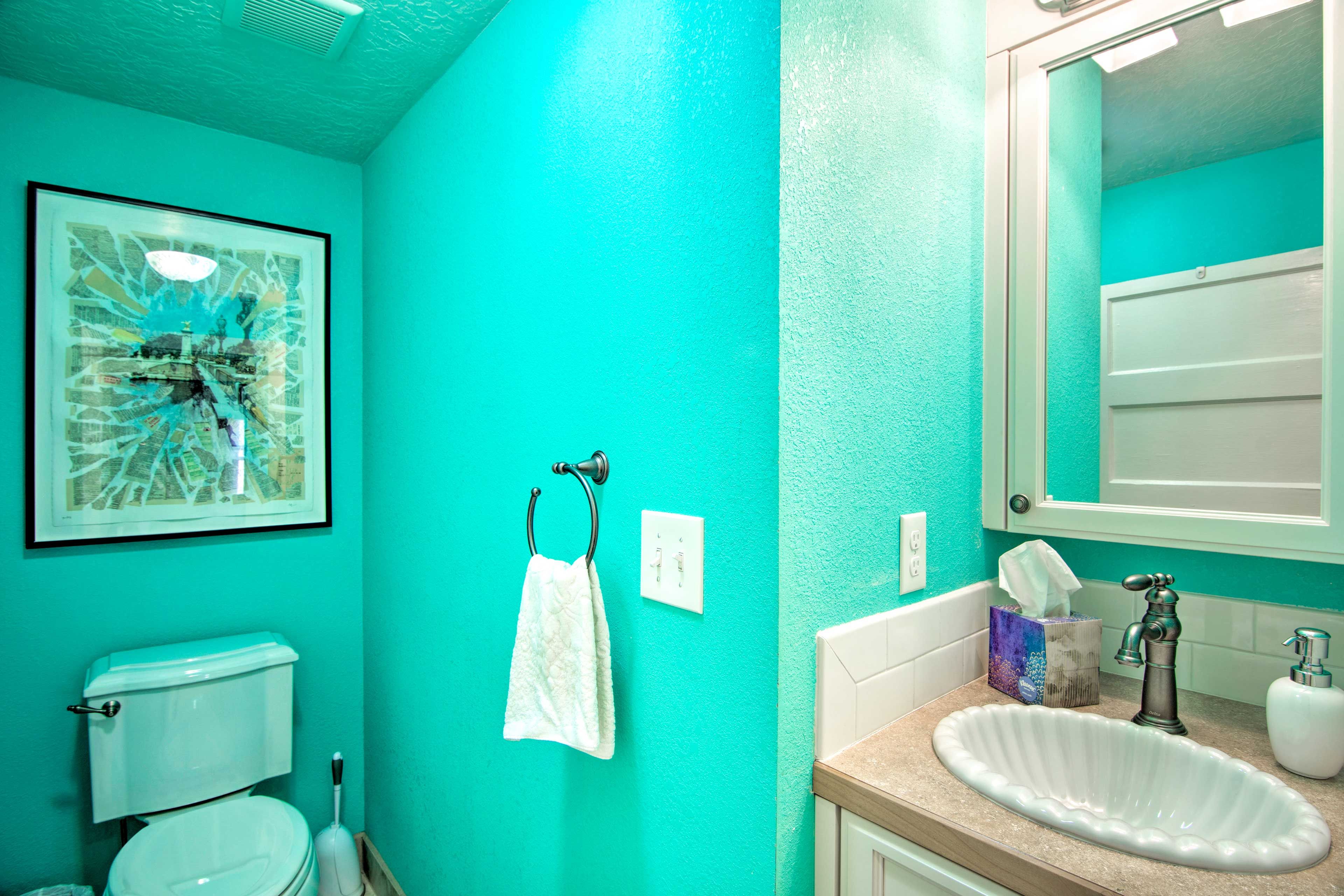 Freshen up in the half bath.