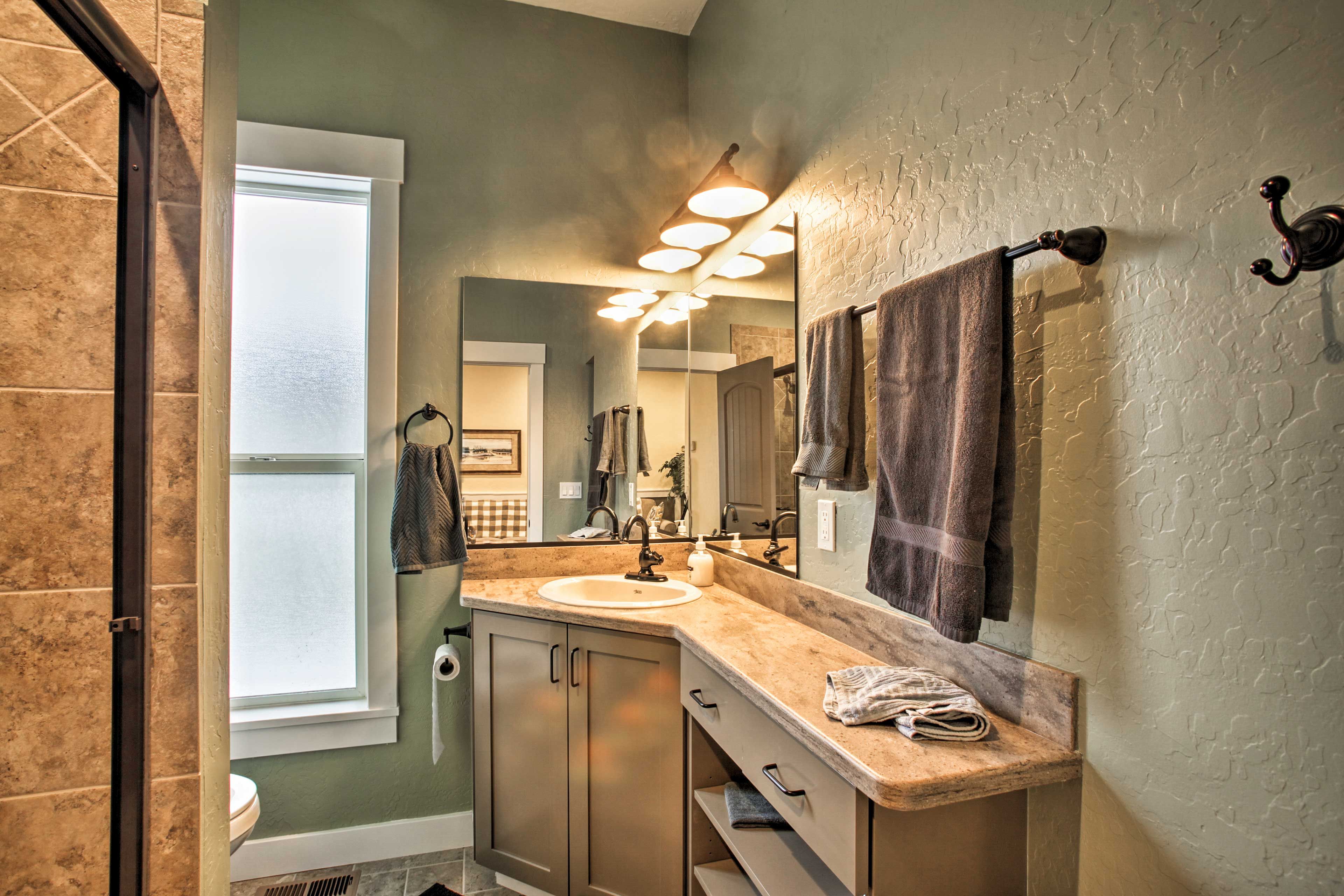 Rinse off the day in this bathroom!