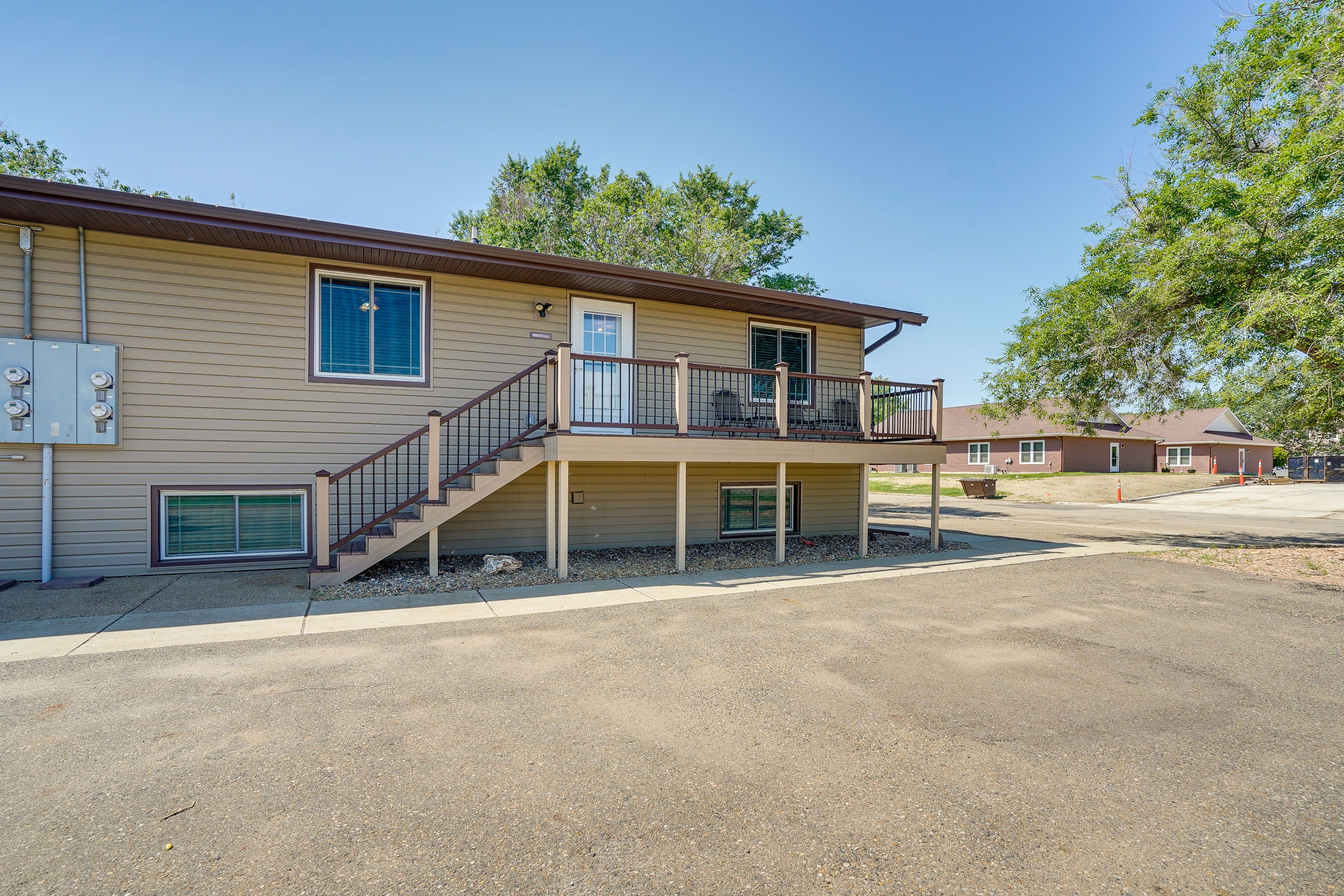 Exterior | 2 Shared Parking Lots (Ample Parking)