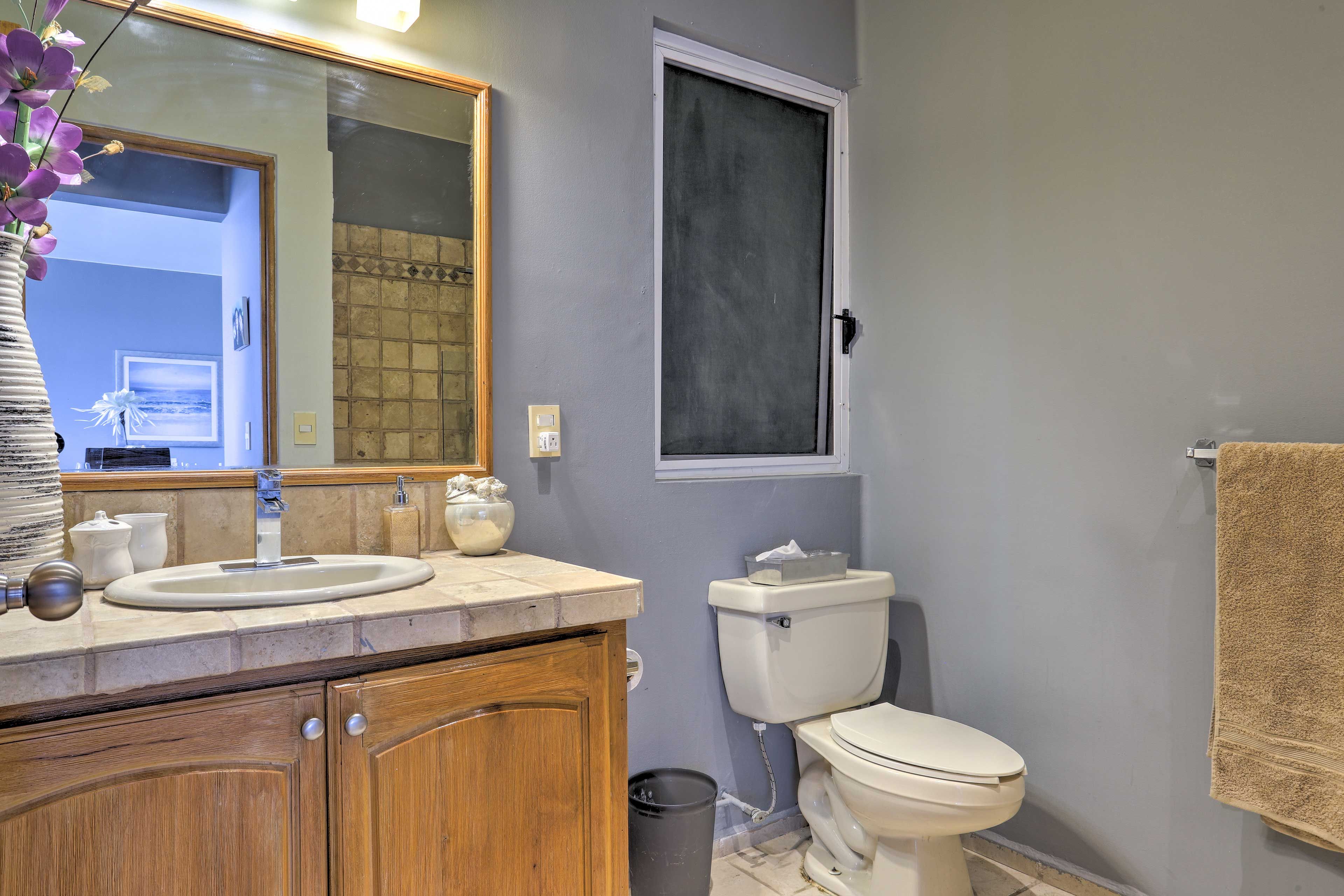 The second full bathroom offers a shower/tub combo.